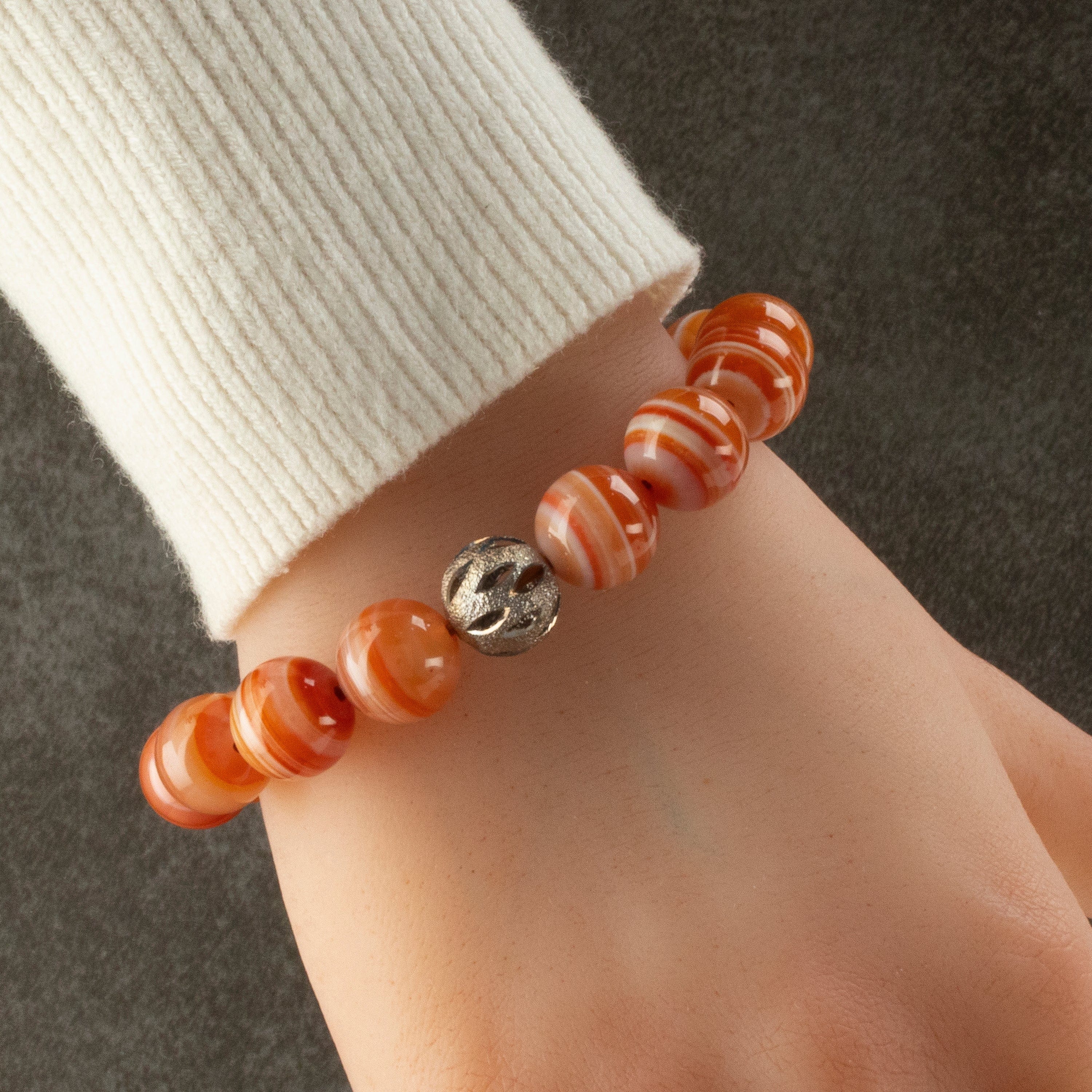 Kalifano Gemstone Bracelets Polished Banded Carnelian 12mm Gemstone Bead Elastic Bracelet with Silver Accent Bead GOLD-BGP-070
