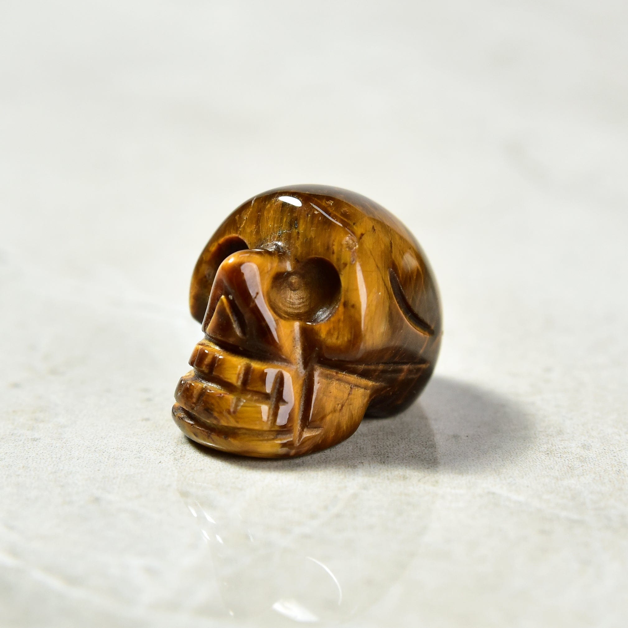 KALIFANO Gemstone Carvings 1" Tiger Eye Skull Natural Gemstone Carving CV4-SK-TE