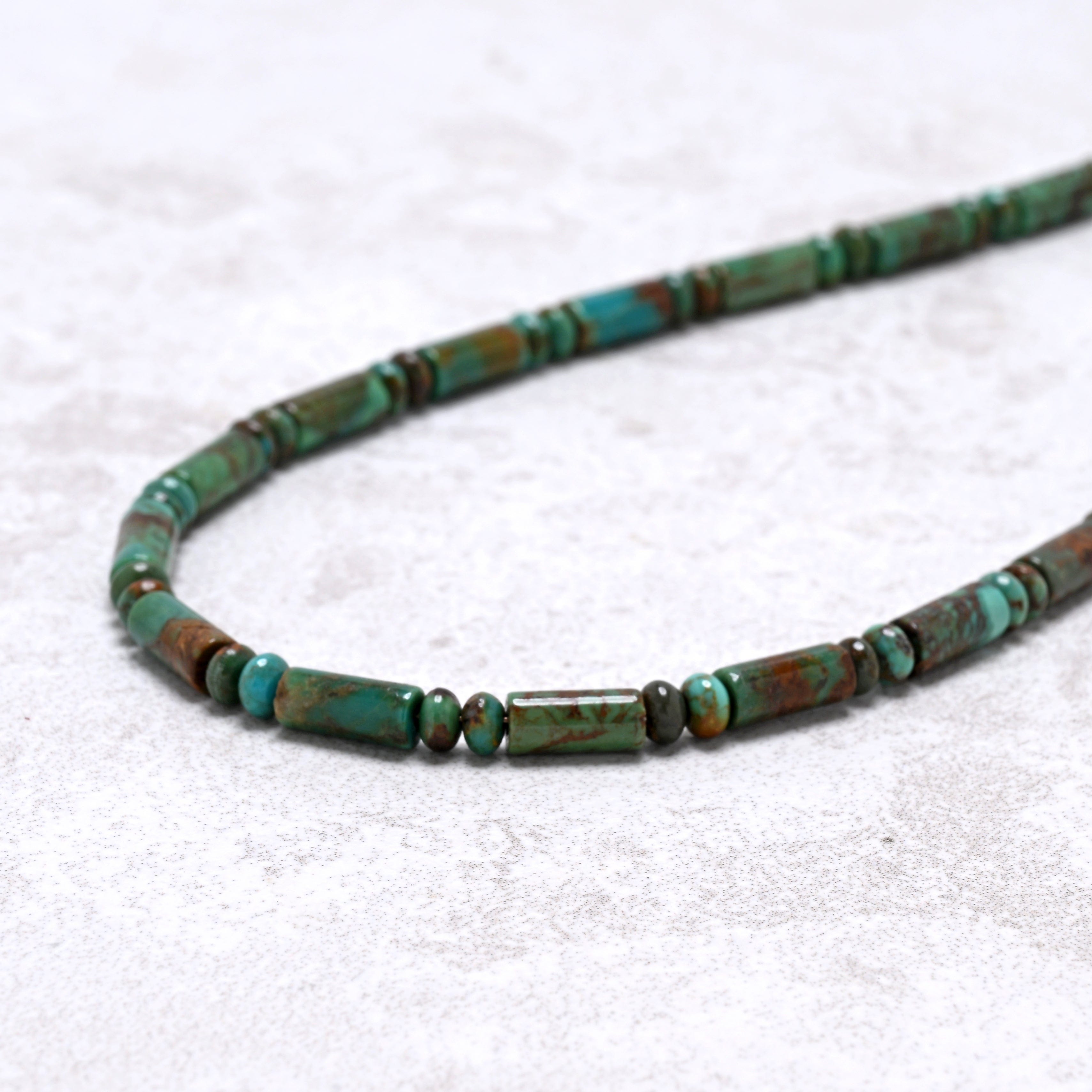KALIFANO Gemstone Jewelry 21" Genuine Turquoise Barrel Beaded Necklace with Sterling Silver Equestrian Clasp 925N-07-TQ