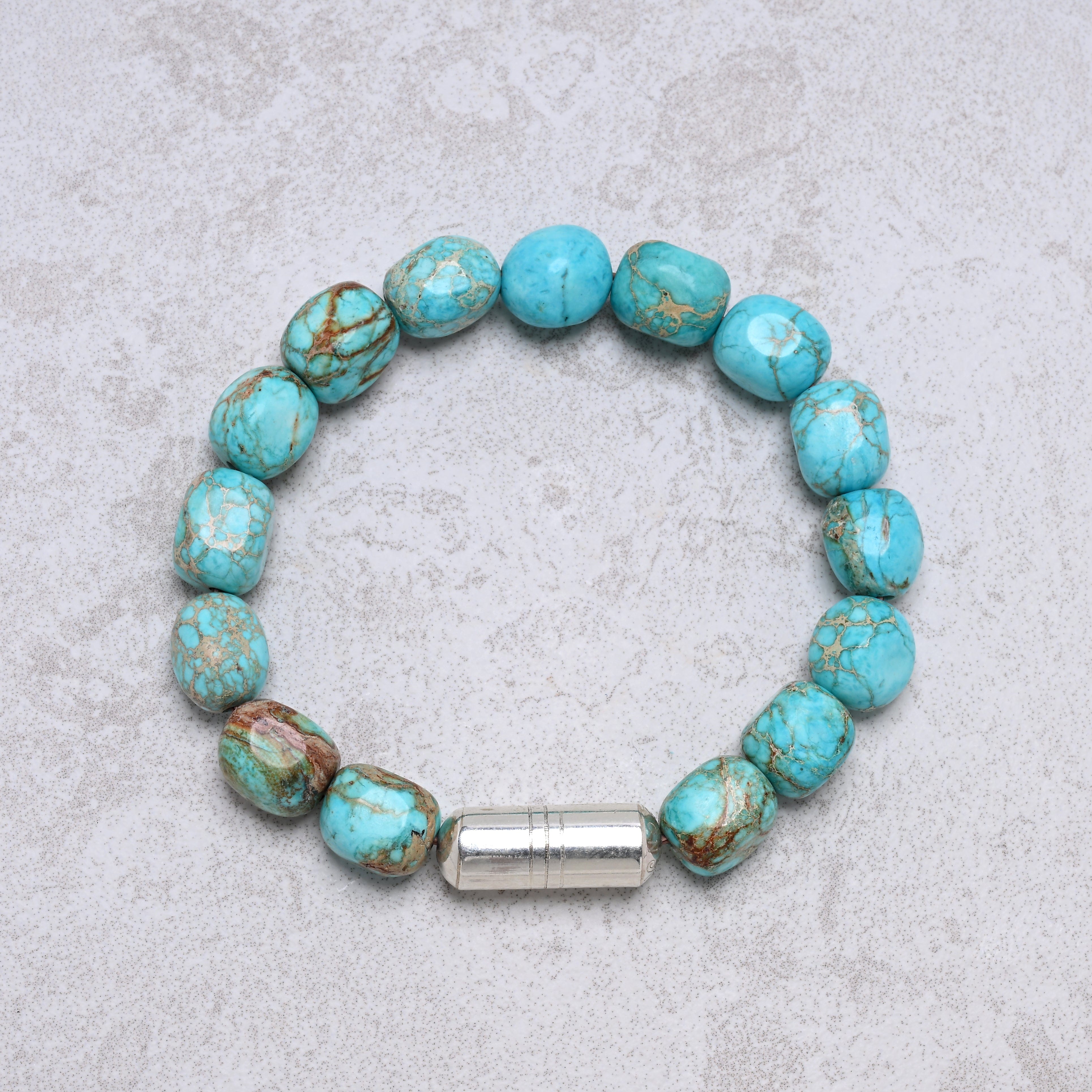 KALIFANO Gemstone Jewelry 6.3" Elastic Howlite King Turquoise Bracelet with Vintage Native American Sterling Silver Barrel 925B-01-S