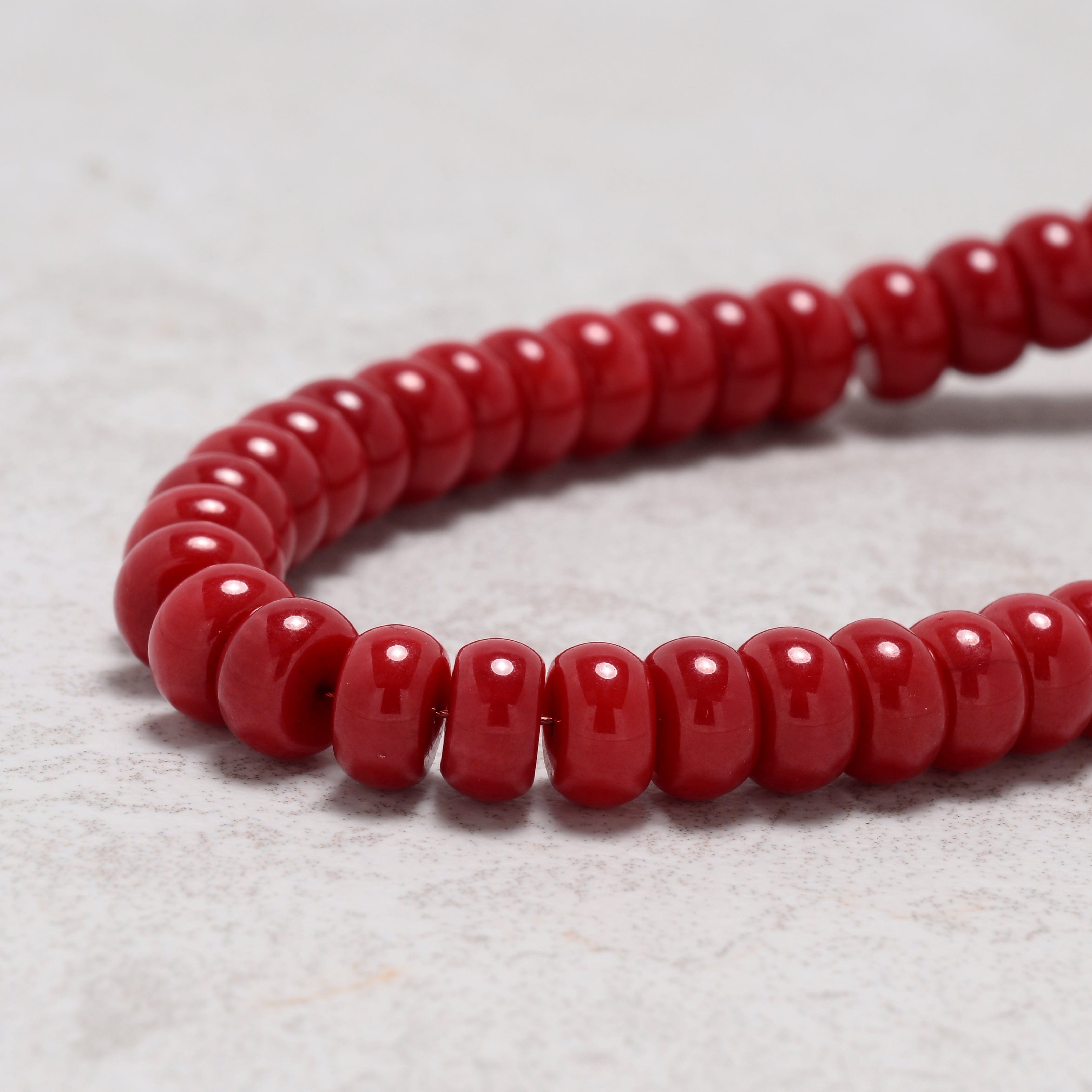 KALIFANO Gemstone Jewelry Coral 4x7mm Natural Gemstone Bracelet with Sterling Silver Clasp 925B-15-S-S