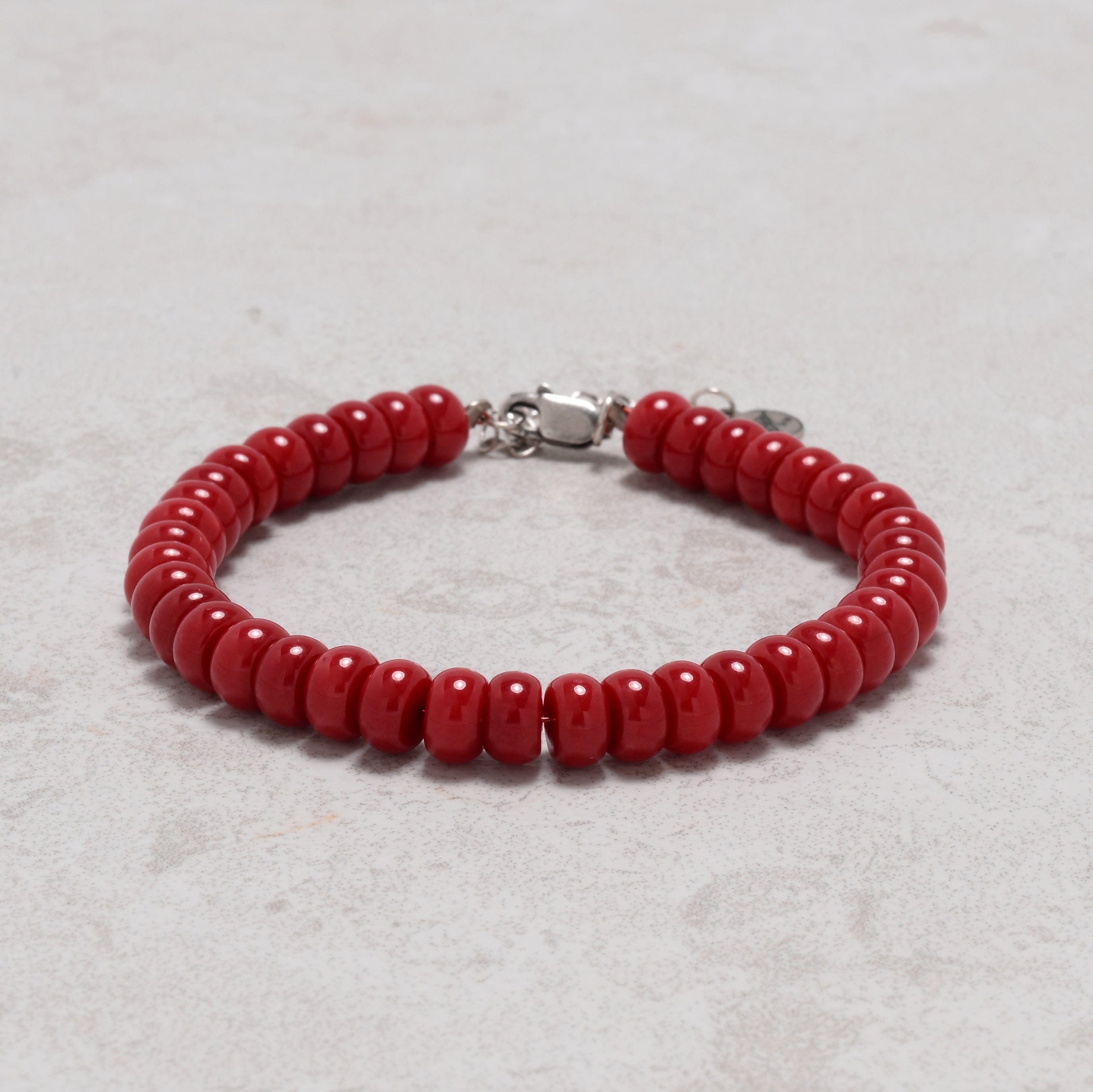 KALIFANO Gemstone Jewelry Coral 4x7mm Natural Gemstone Bracelet with Sterling Silver Clasp 925B-15-S-S