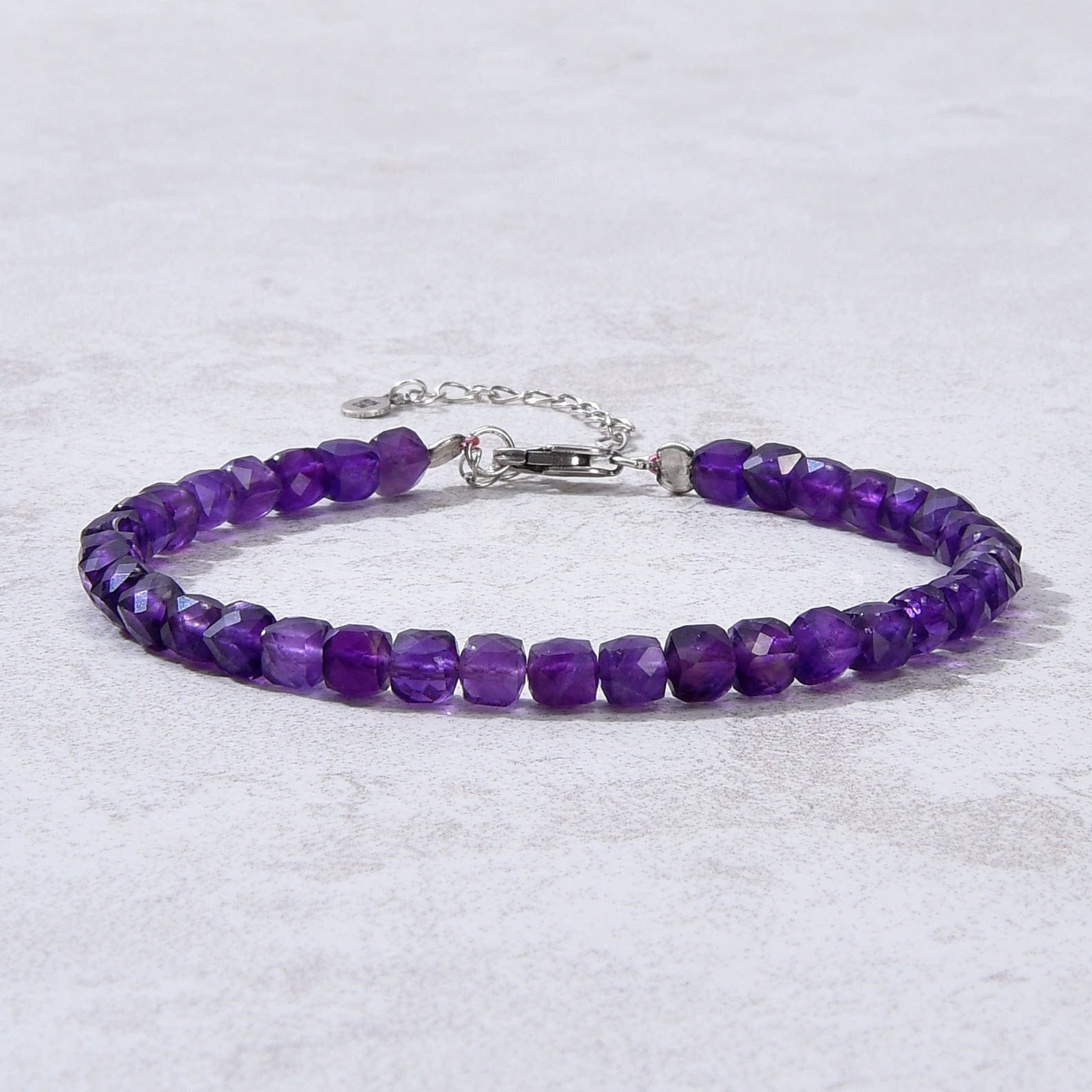 KALIFANO Gemstone Jewelry Natural Amethyst Faceted 4mm Barrel Bracelet with Sterling Silver Extender B4-16S-AM