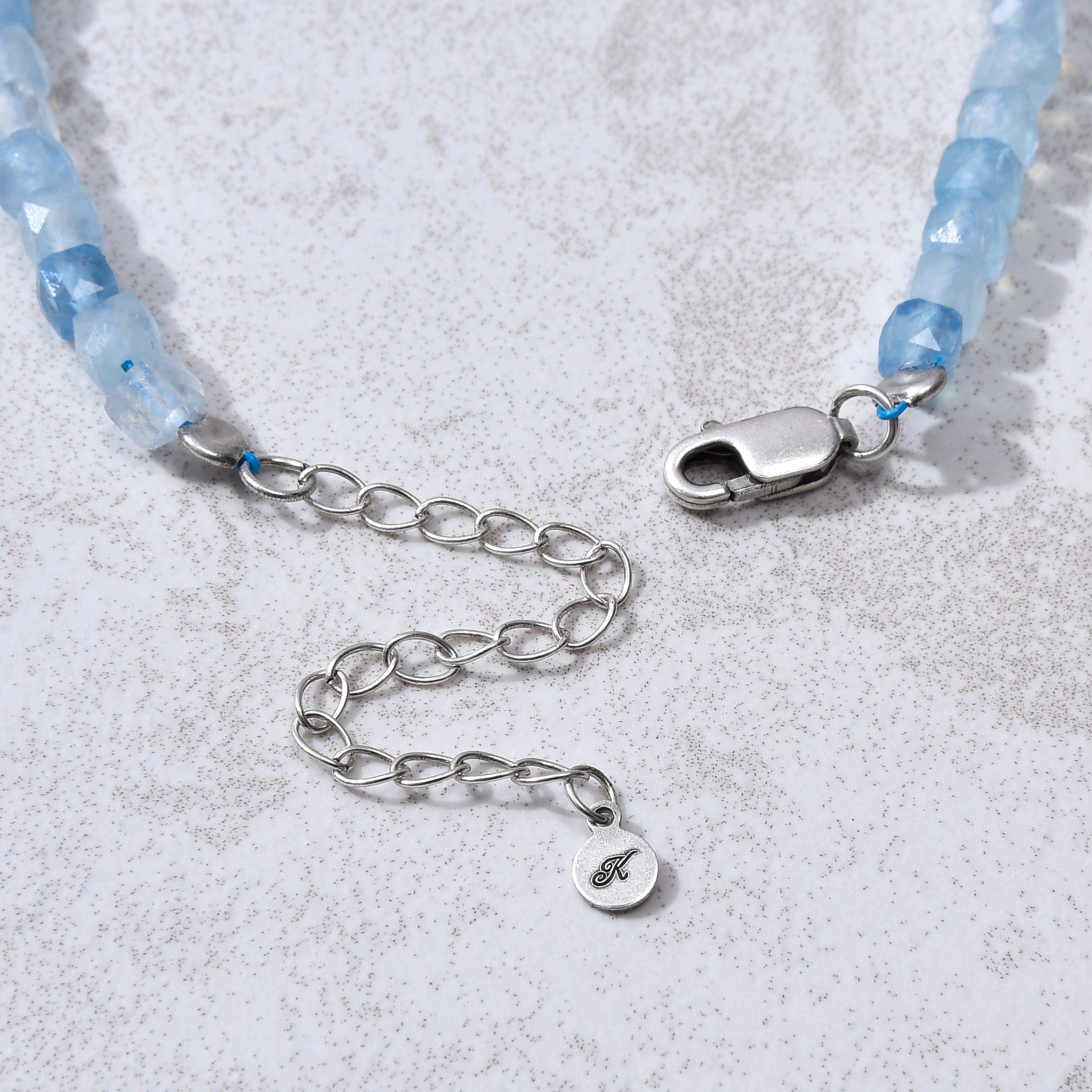 KALIFANO Gemstone Jewelry Natural Aquamarine Faceted 4mm Barrel Bracelet with Sterling Silver Extender B4-16S-AQ
