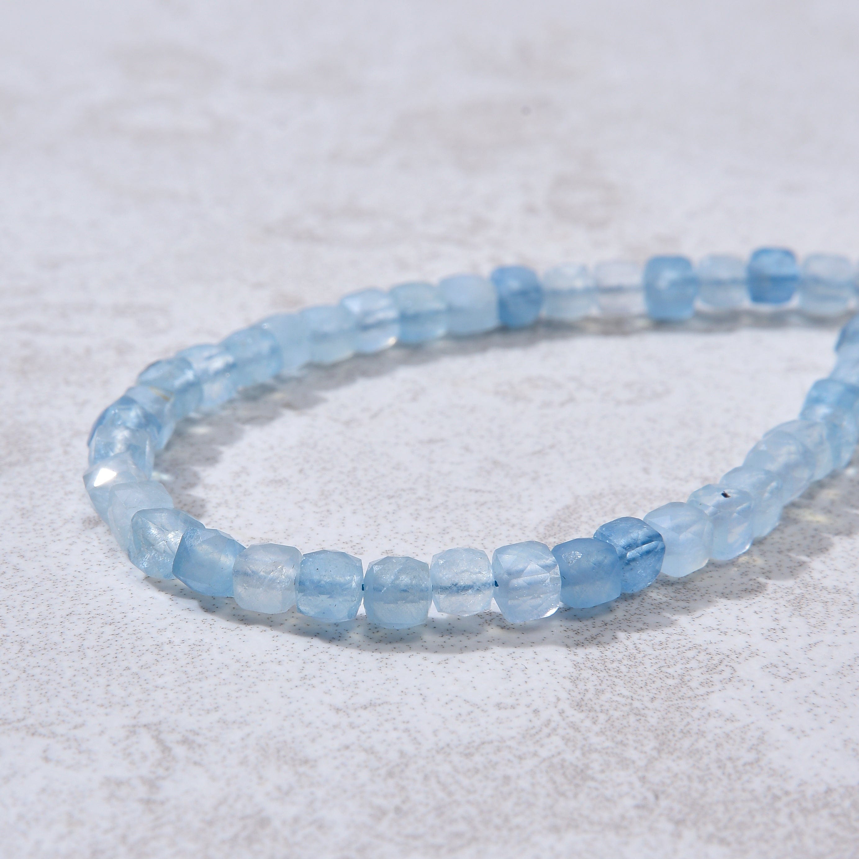 KALIFANO Gemstone Jewelry Natural Aquamarine Faceted 4mm Barrel Bracelet with Sterling Silver Extender B4-16S-AQ