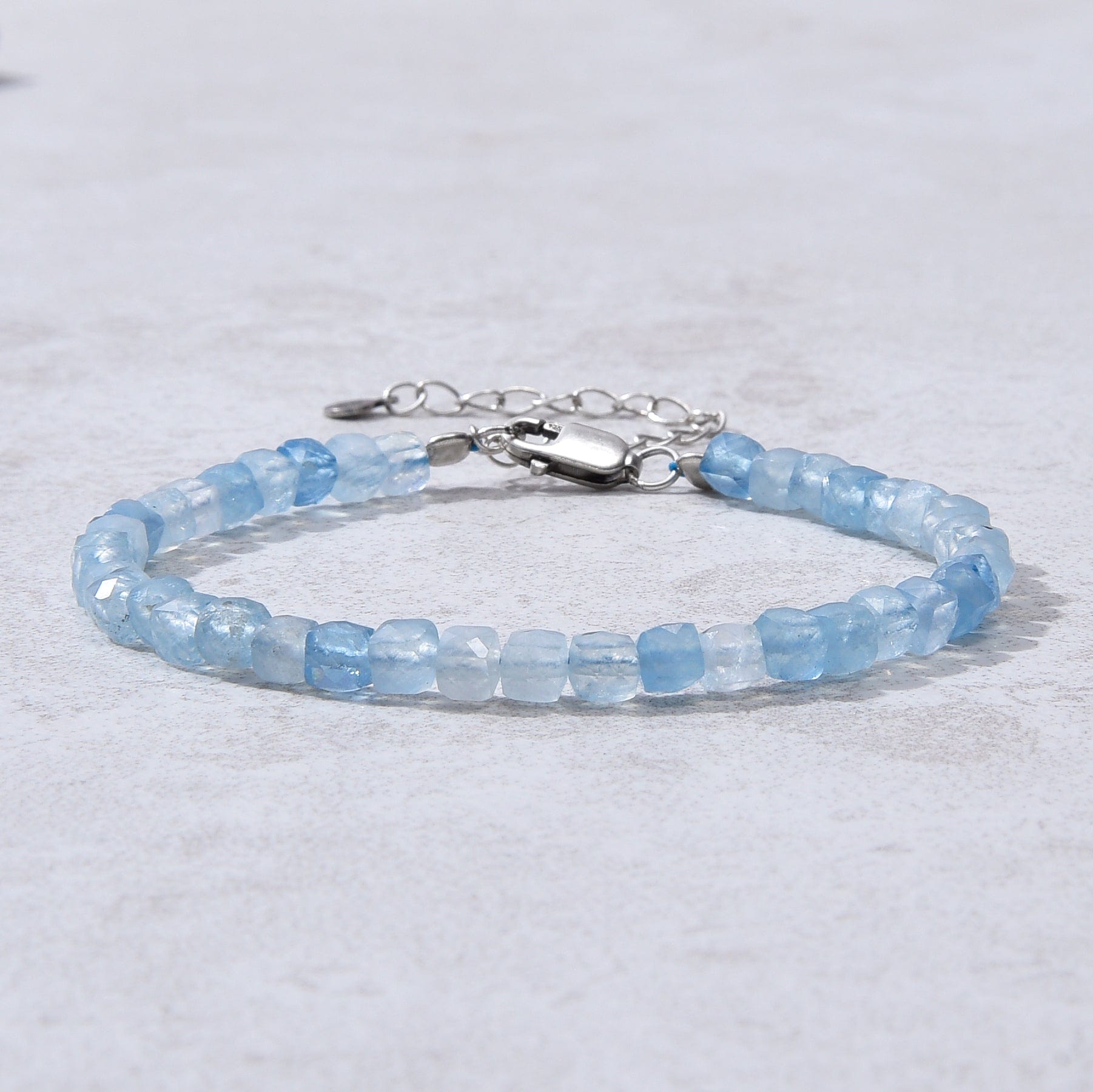 KALIFANO Gemstone Jewelry Natural Aquamarine Faceted 4mm Barrel Bracelet with Sterling Silver Extender B4-16S-AQ