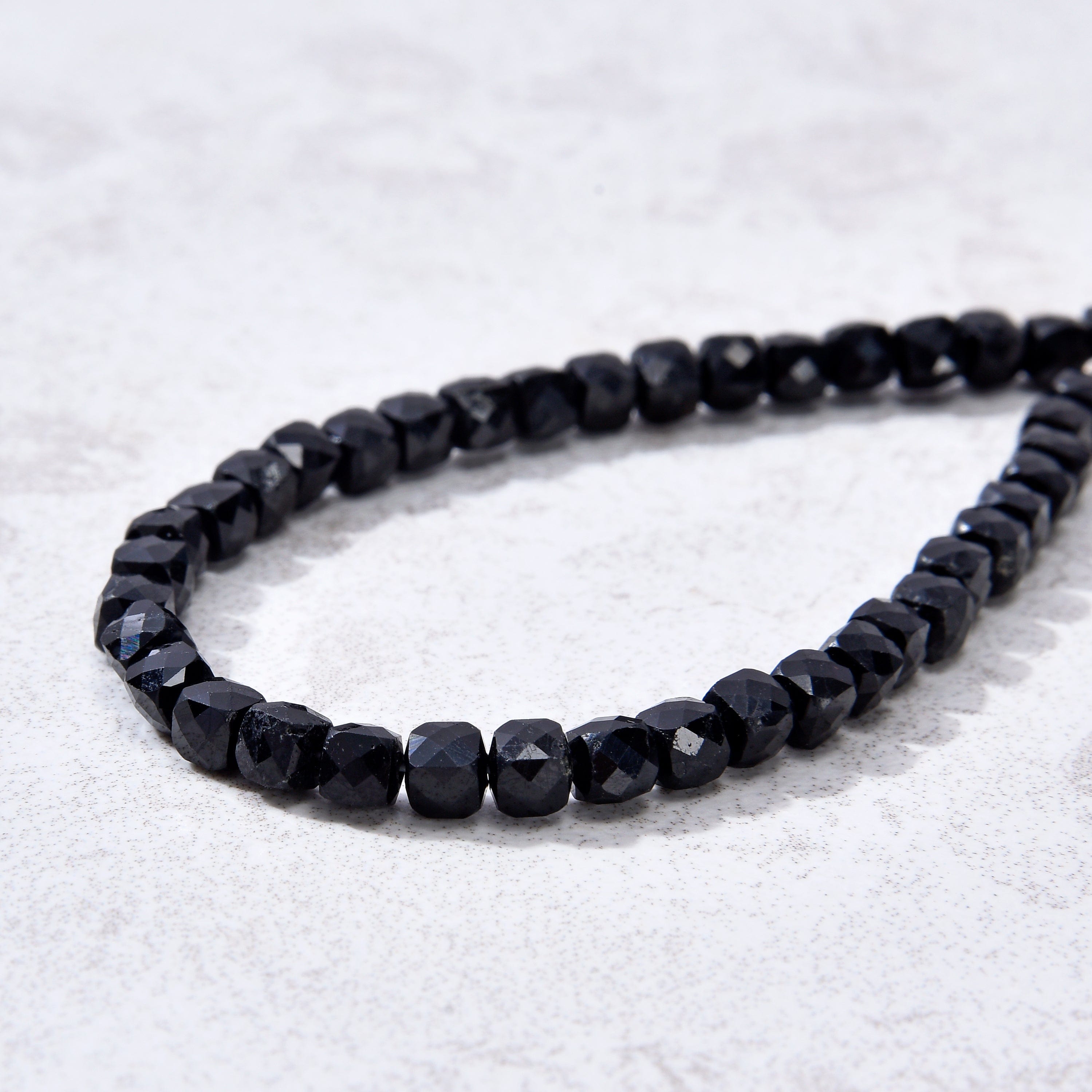 KALIFANO Gemstone Jewelry Natural Black Tourmaline Faceted 4mm Barrel Bracelet with Sterling Silver Extender B4-16S-BT