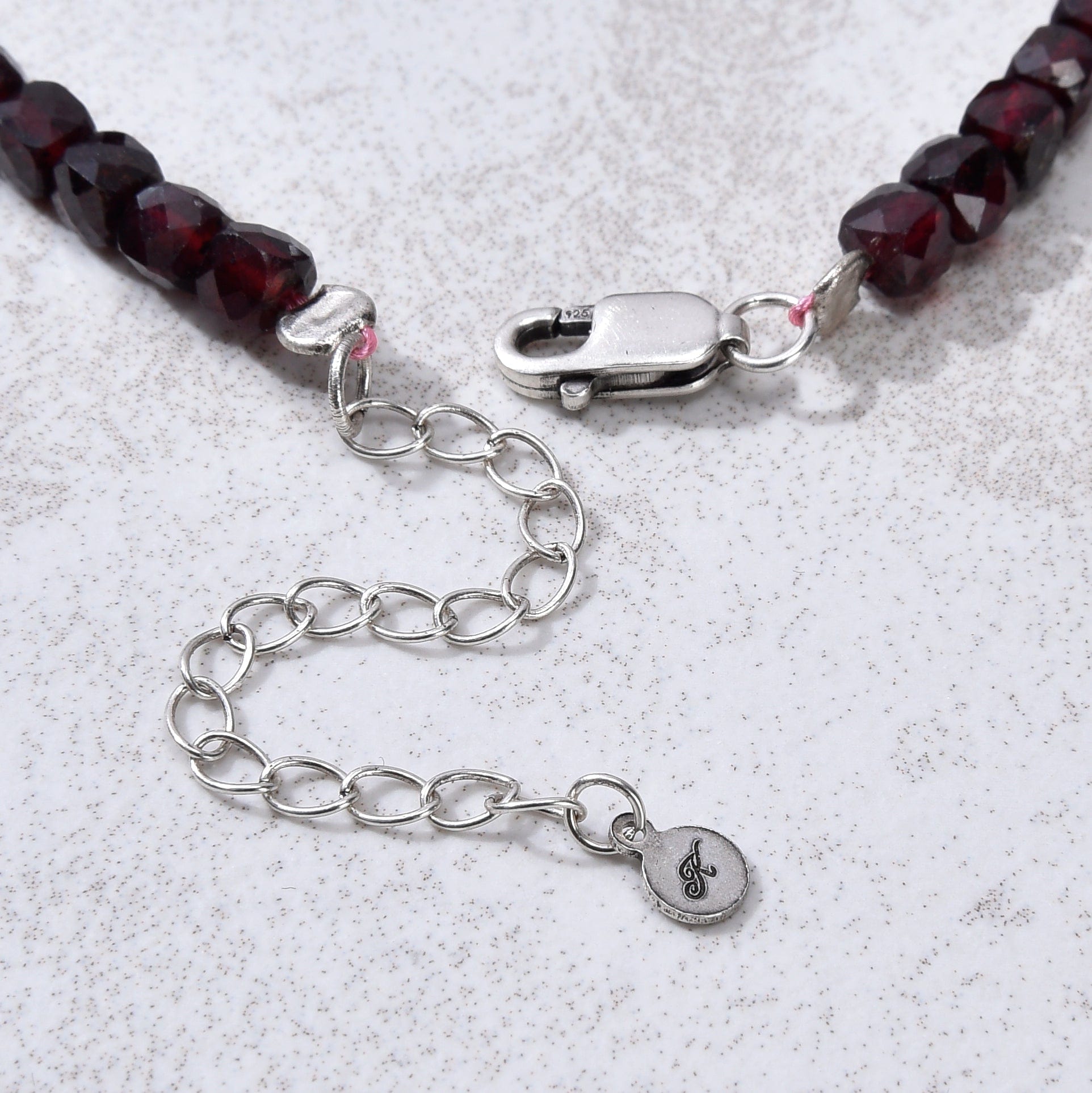 KALIFANO Gemstone Jewelry Natural Garnet Faceted 4mm Barrel Bracelet with Sterling Silver Extender B4-16S-GA