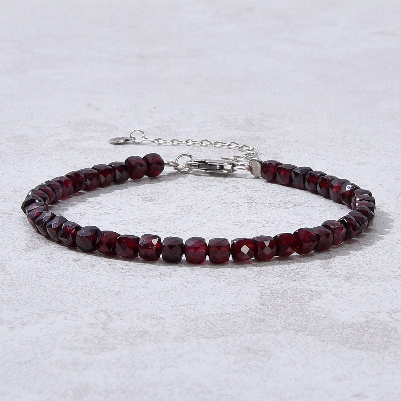 KALIFANO Gemstone Jewelry Natural Garnet Faceted 4mm Barrel Bracelet with Sterling Silver Extender B4-16S-GA