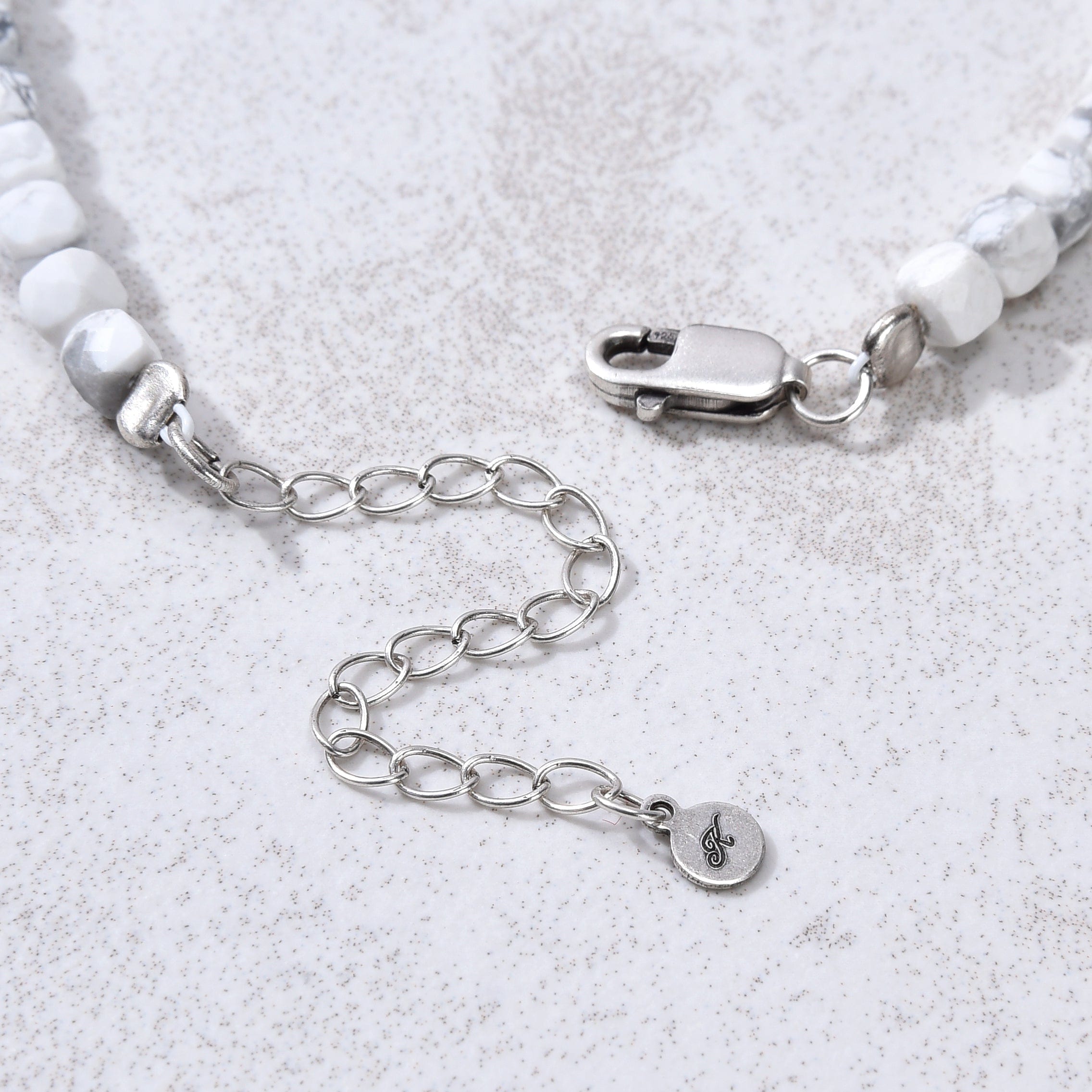 KALIFANO Gemstone Jewelry Natural Howlite Faceted 4mm Barrel Bracelet with Sterling Silver Extender B4-16S-HT