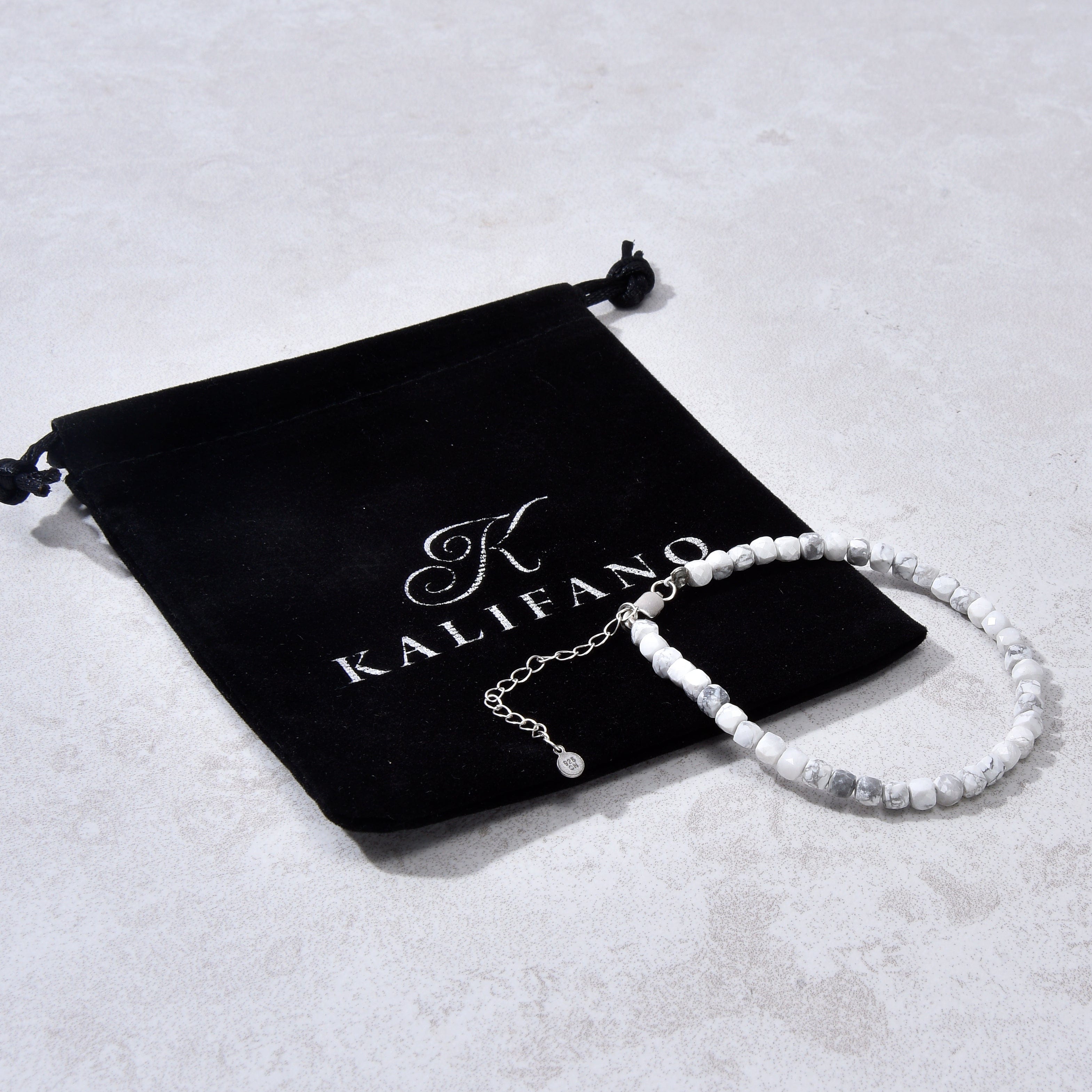 KALIFANO Gemstone Jewelry Natural Howlite Faceted 4mm Barrel Bracelet with Sterling Silver Extender B4-16S-HT