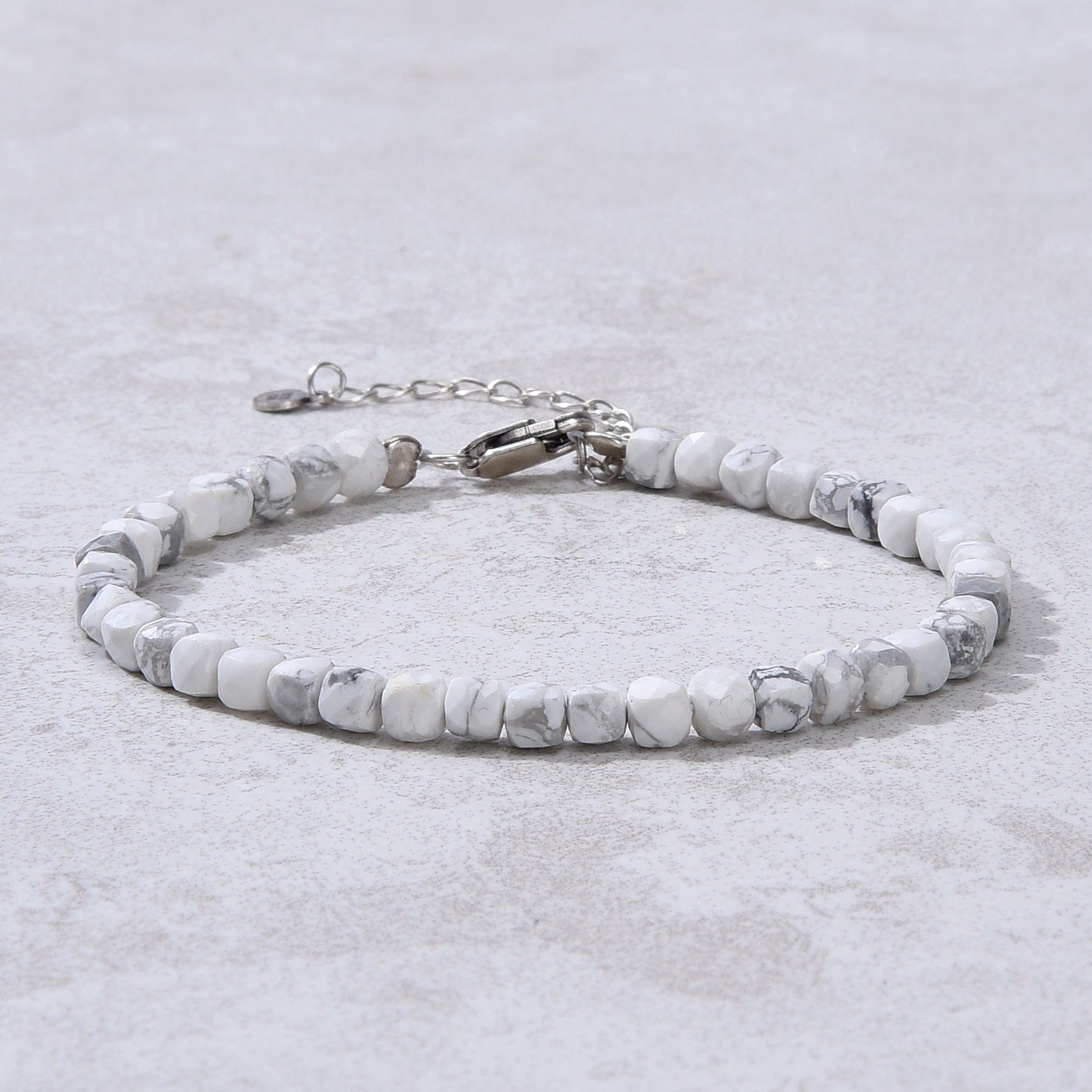 KALIFANO Gemstone Jewelry Natural Howlite Faceted 4mm Barrel Bracelet with Sterling Silver Extender B4-16S-HT