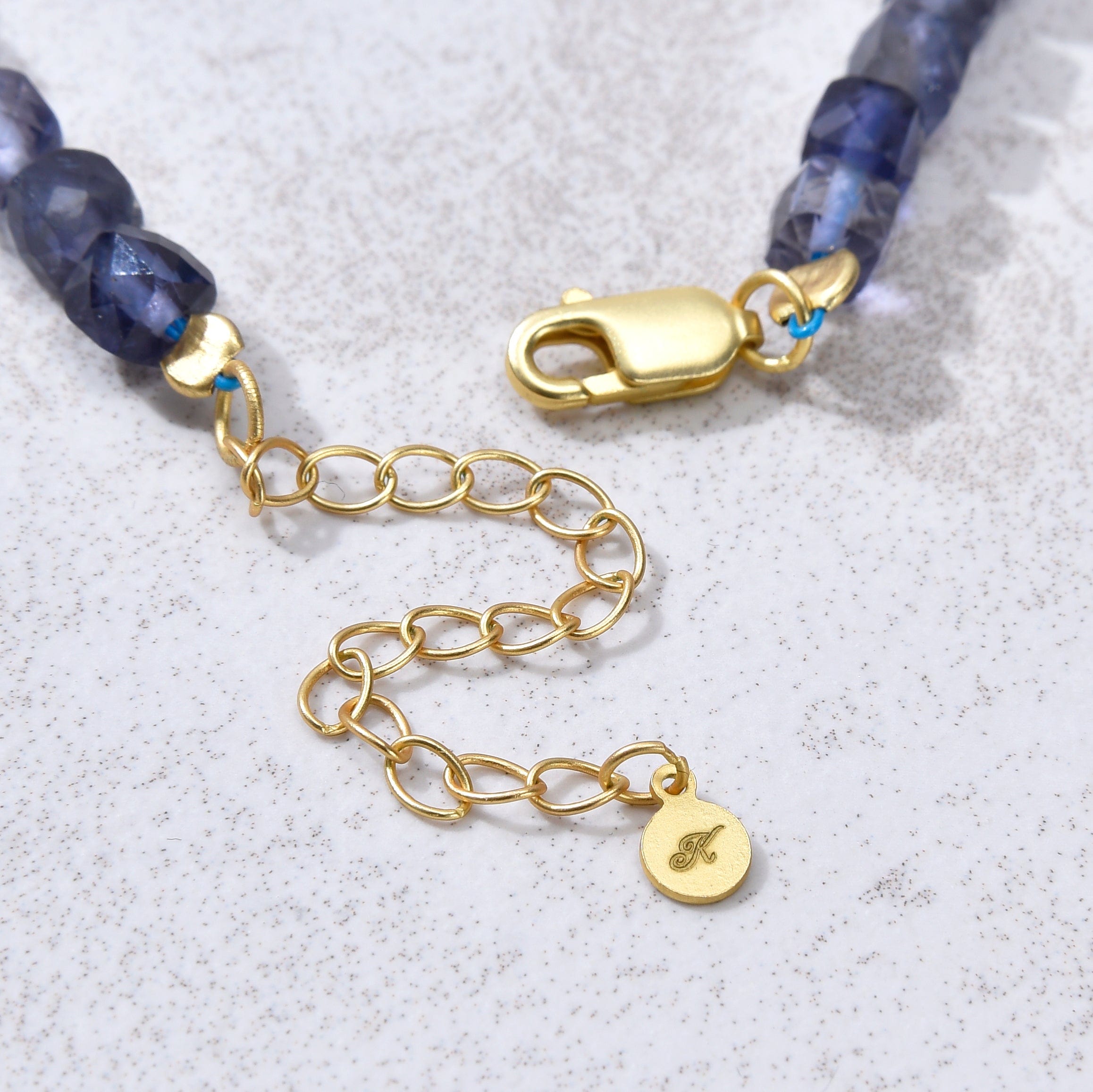 KALIFANO Gemstone Jewelry Natural Iolite Faceted 4mm Barrel Bracelet with Sterling Silver Extender B4-16G-IO