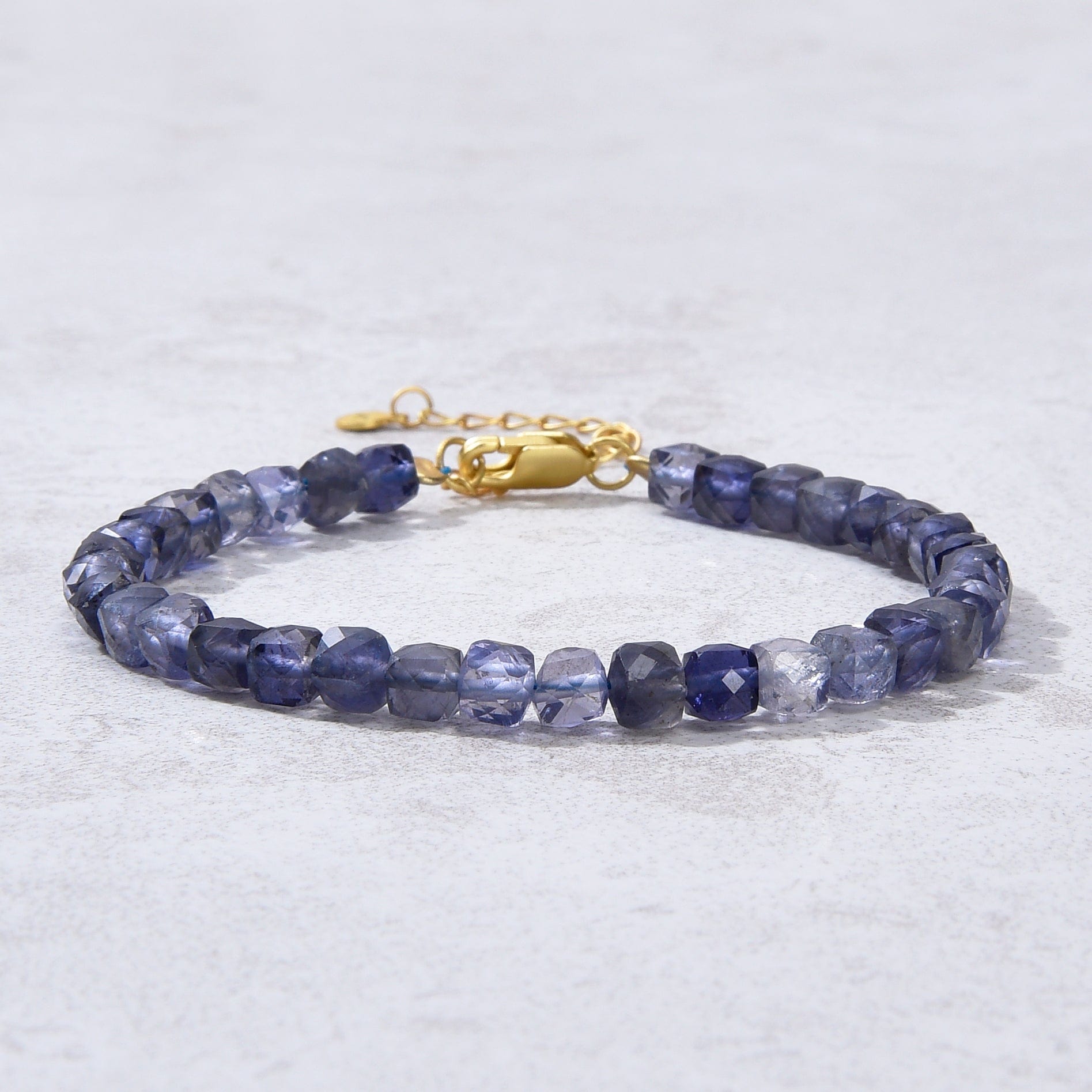 KALIFANO Gemstone Jewelry Natural Iolite Faceted 4mm Barrel Bracelet with Sterling Silver Extender B4-16G-IO