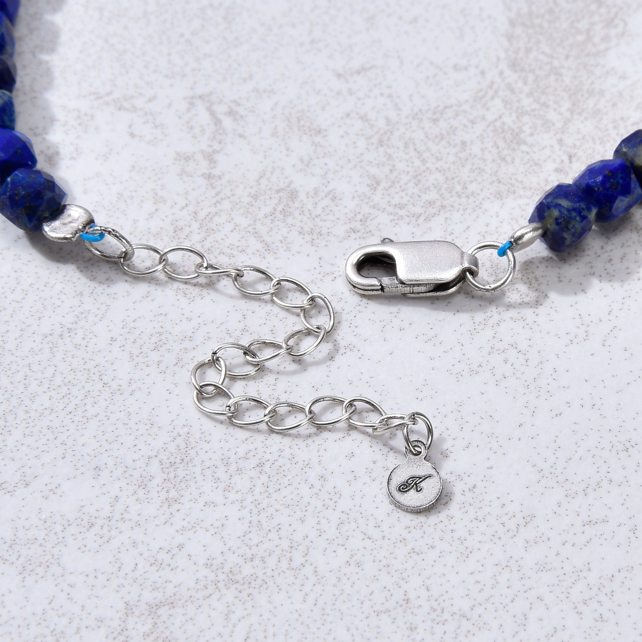 KALIFANO Gemstone Jewelry Natural Lapis Faceted 4mm Barrel Bracelet with Sterling Silver Extender B4-16S-LP
