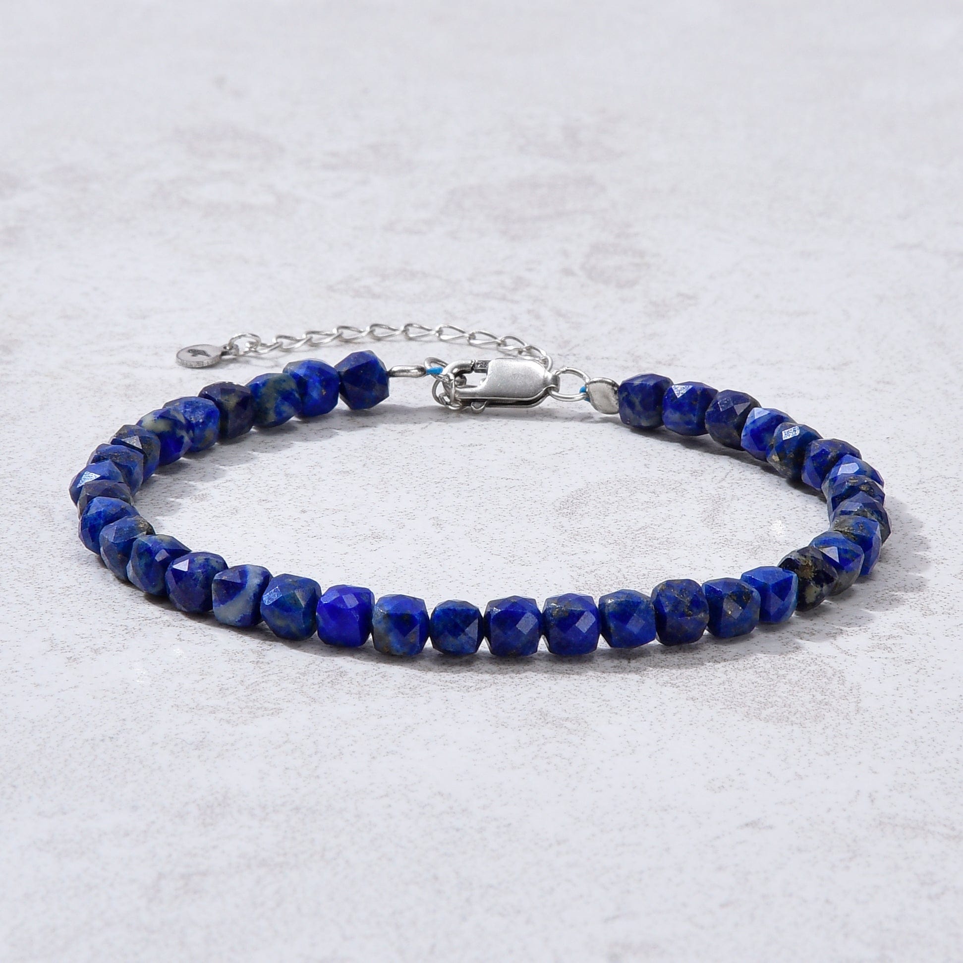 KALIFANO Gemstone Jewelry Natural Lapis Faceted 4mm Barrel Bracelet with Sterling Silver Extender B4-16S-LP