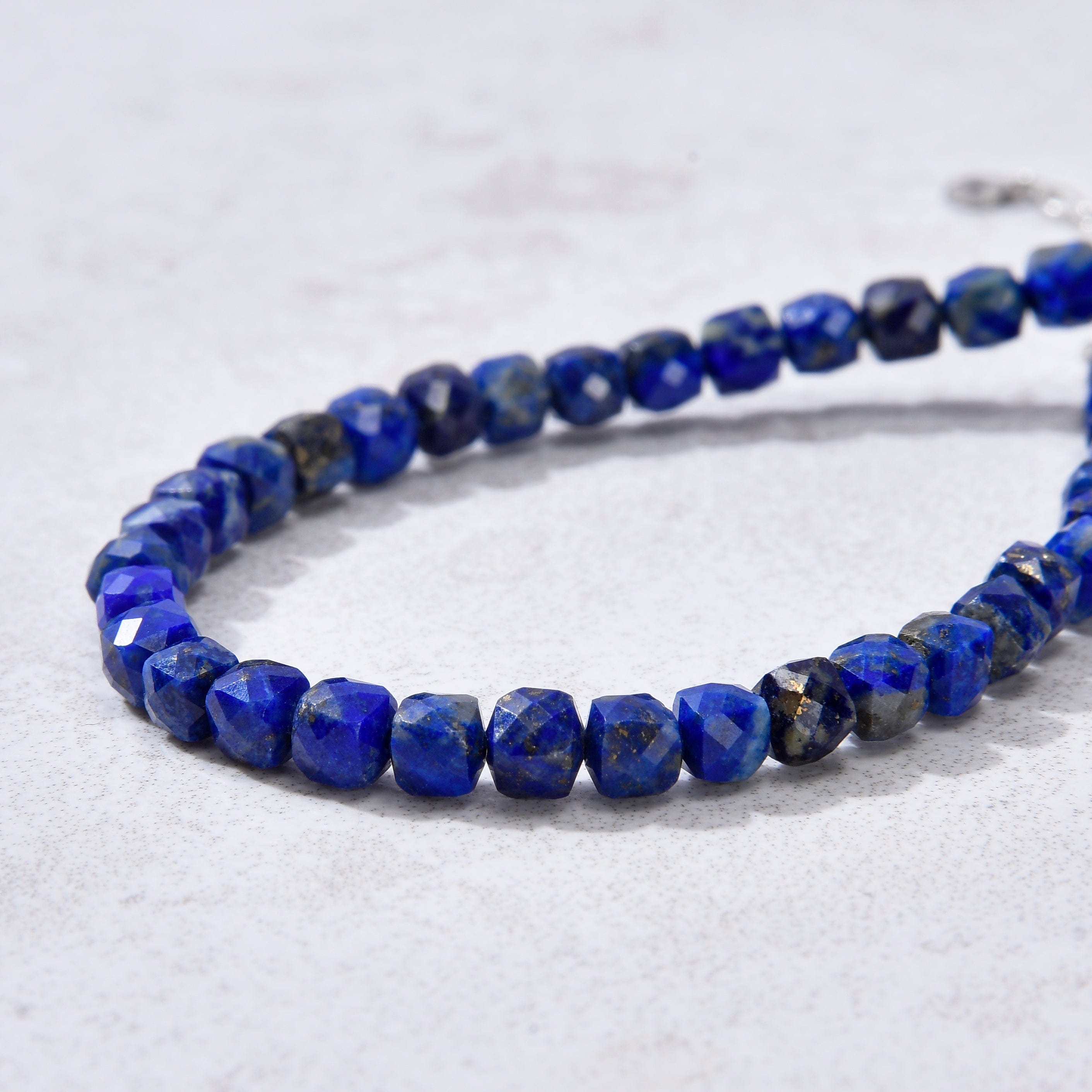 KALIFANO Gemstone Jewelry Natural Lapis Faceted 4mm Barrel Bracelet with Sterling Silver Extender B4-16S-LP