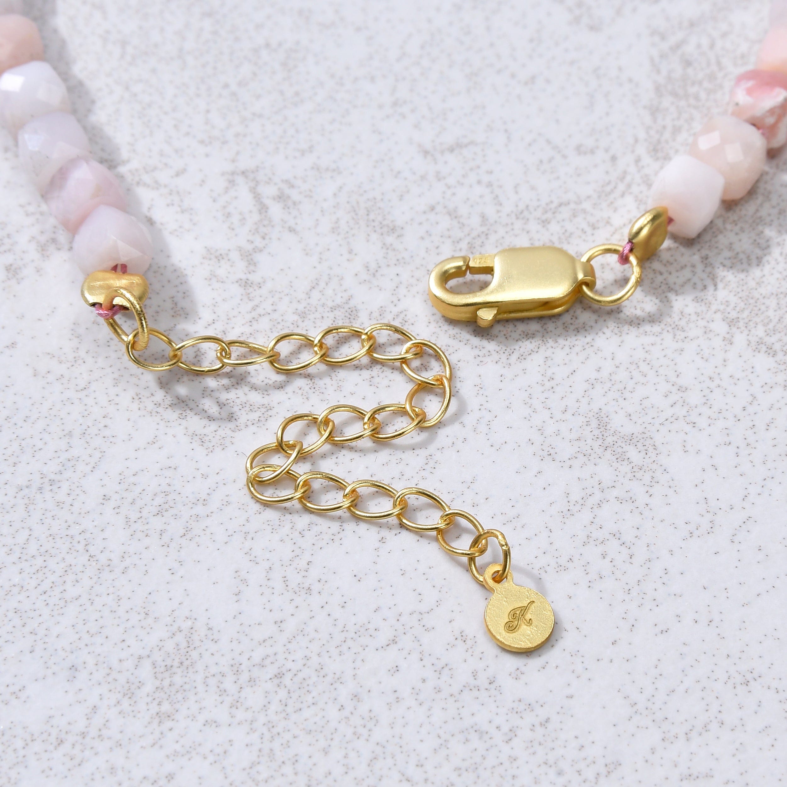 KALIFANO Gemstone Jewelry Natural Pink Opal Faceted 4mm Barrel Bracelet with Sterling Silver Extender B4-16G-PO