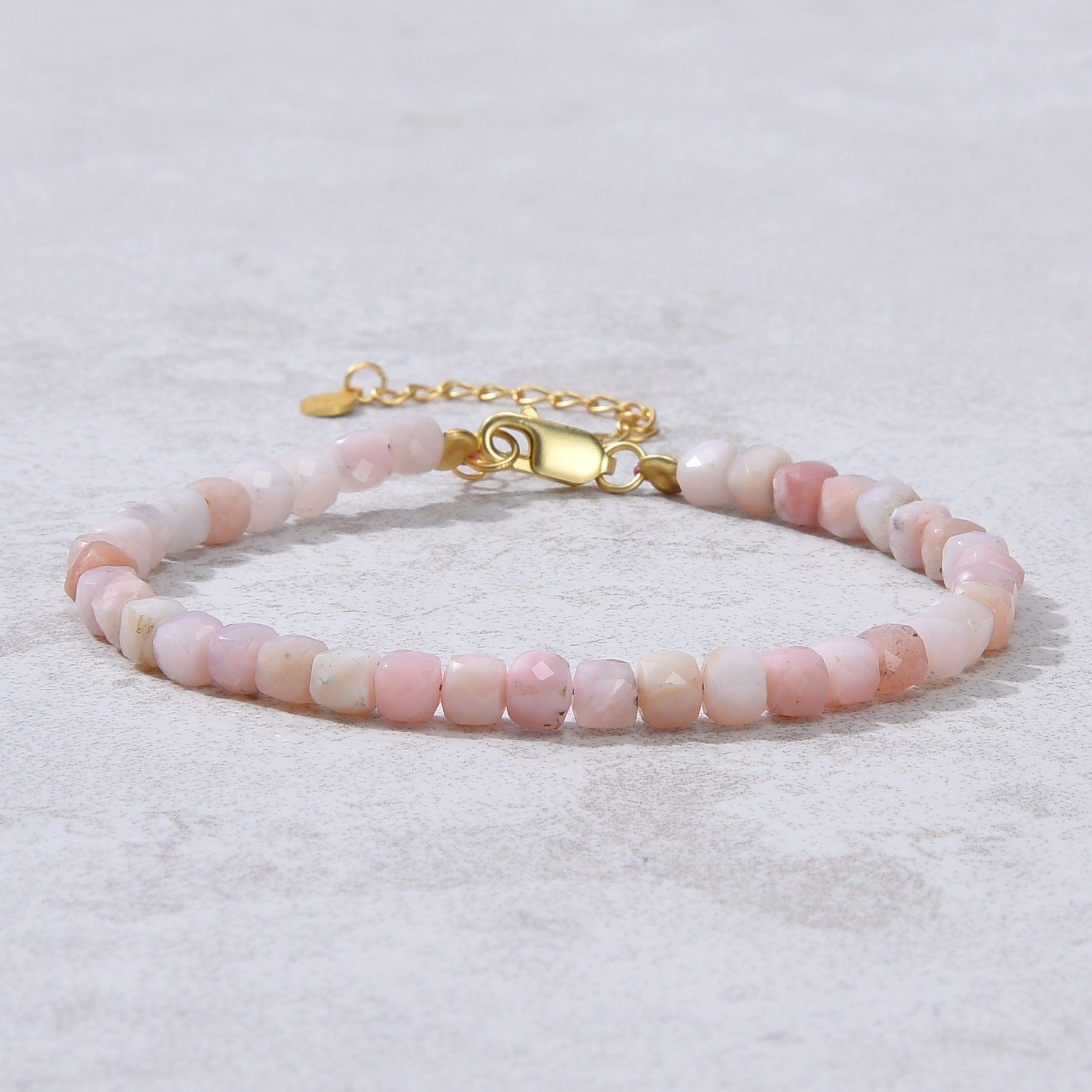KALIFANO Gemstone Jewelry Natural Pink Opal Faceted 4mm Barrel Bracelet with Sterling Silver Extender B4-16G-PO