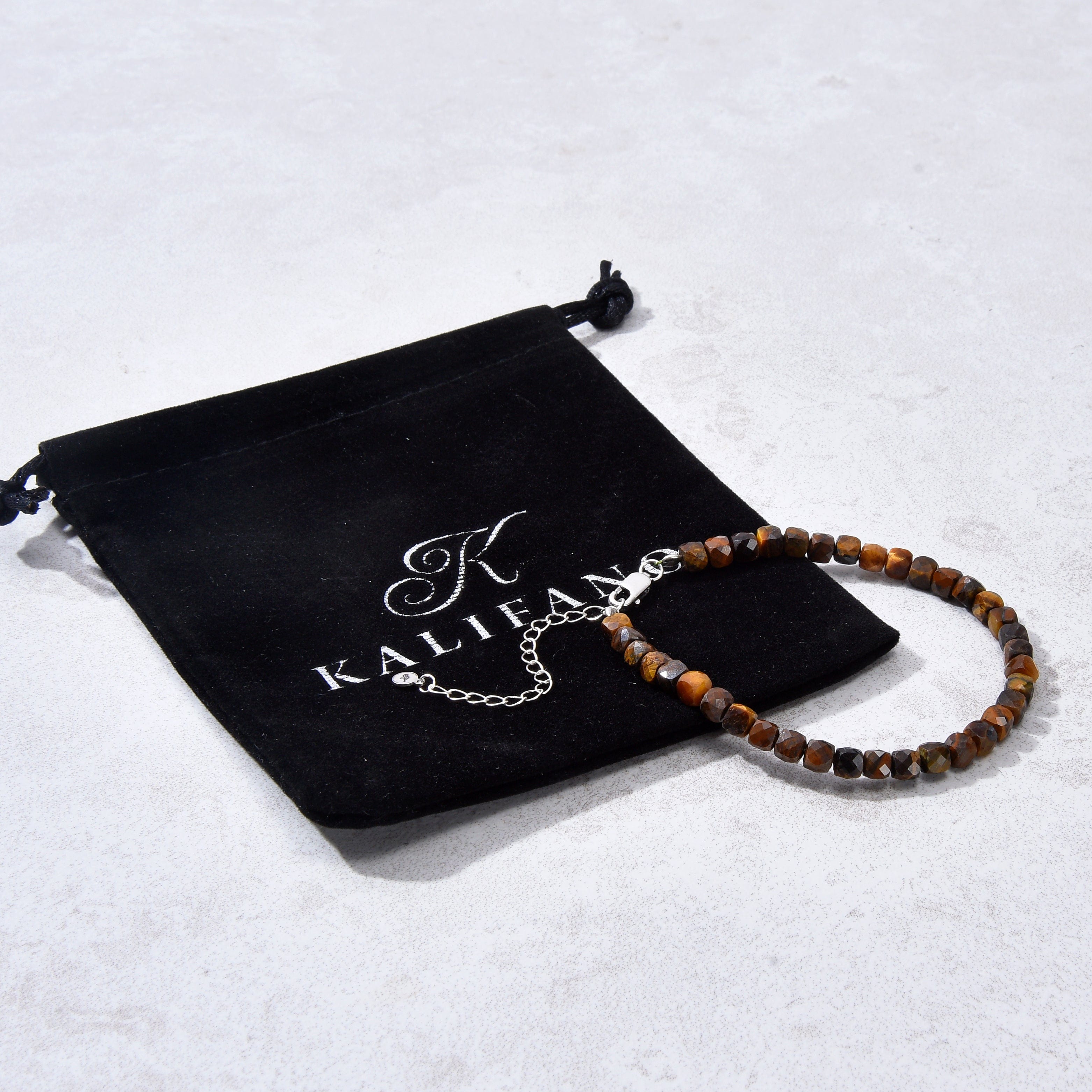 KALIFANO Gemstone Jewelry Natural Tiger Eye Faceted 4mm Barrel Bracelet with Sterling Silver Extender B4-16S-TE