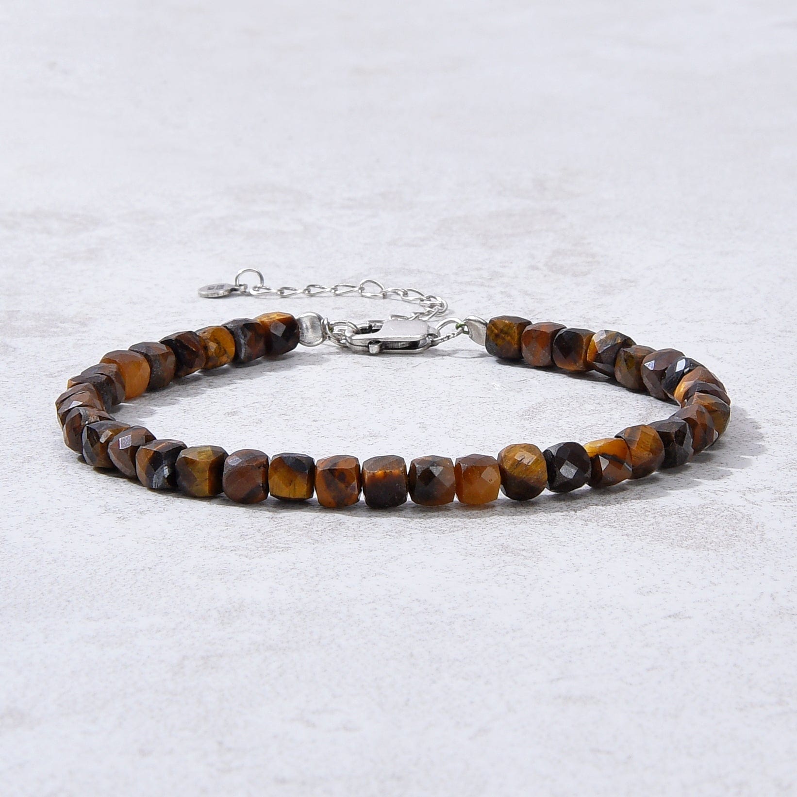 KALIFANO Gemstone Jewelry Natural Tiger Eye Faceted 4mm Barrel Bracelet with Sterling Silver Extender B4-16S-TE