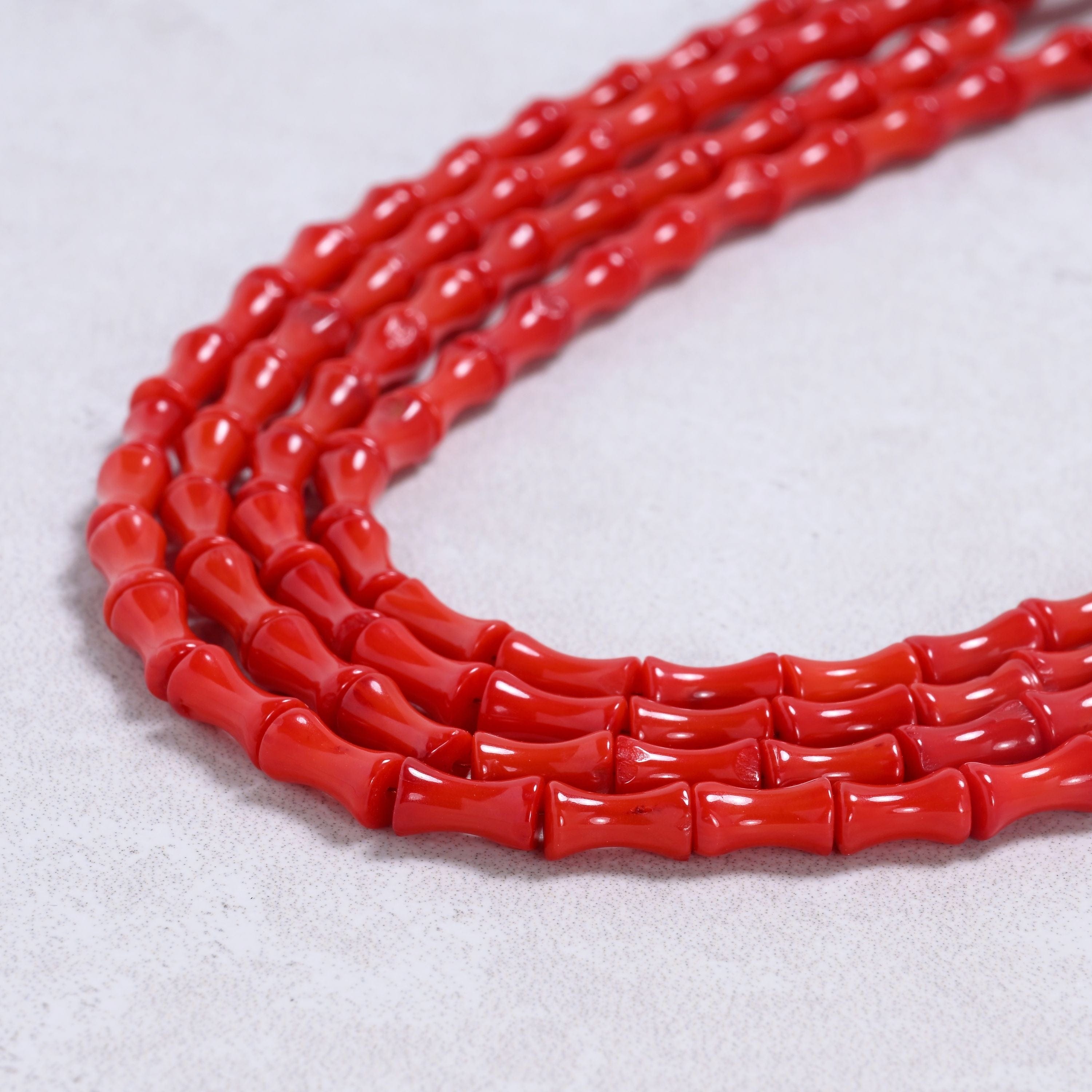 Kalifano Gemstone Jewelry Red Coral 5x8mm Bamboo Gemstone Necklace with Sterling Silver Clasp - 20" 8GN-RC