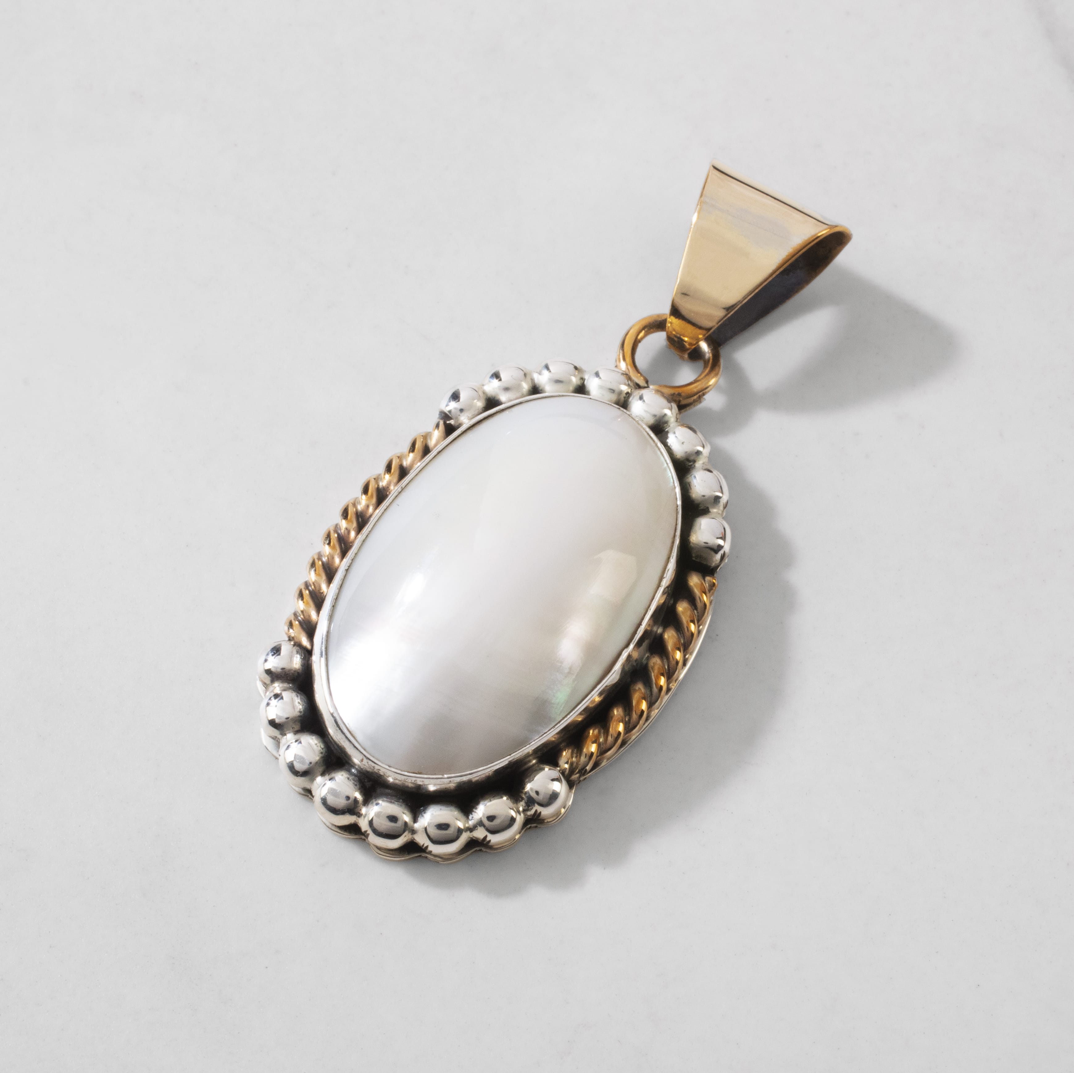 Kalifano Native American Jewelry L. Sheka Mother of Pearl Navajo USA Native American Made 925 Sterling Silver & 12K Gold Filled Pendant NAN500.014