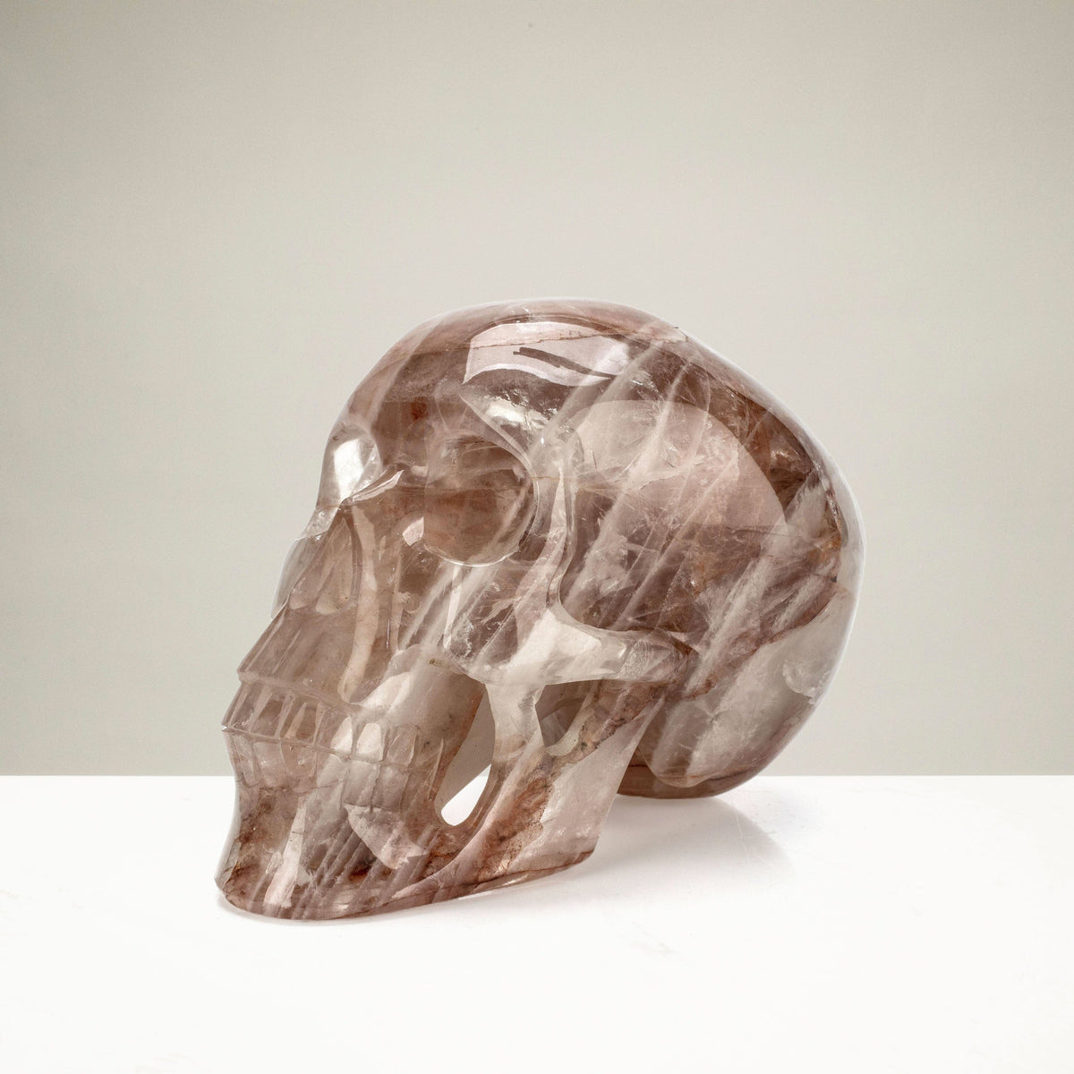 Kalifano Quartz Natural Hand Carved Brazilian Hematoid Quartz Skull - 5.5 in. / 1,540 grams SK7000.002