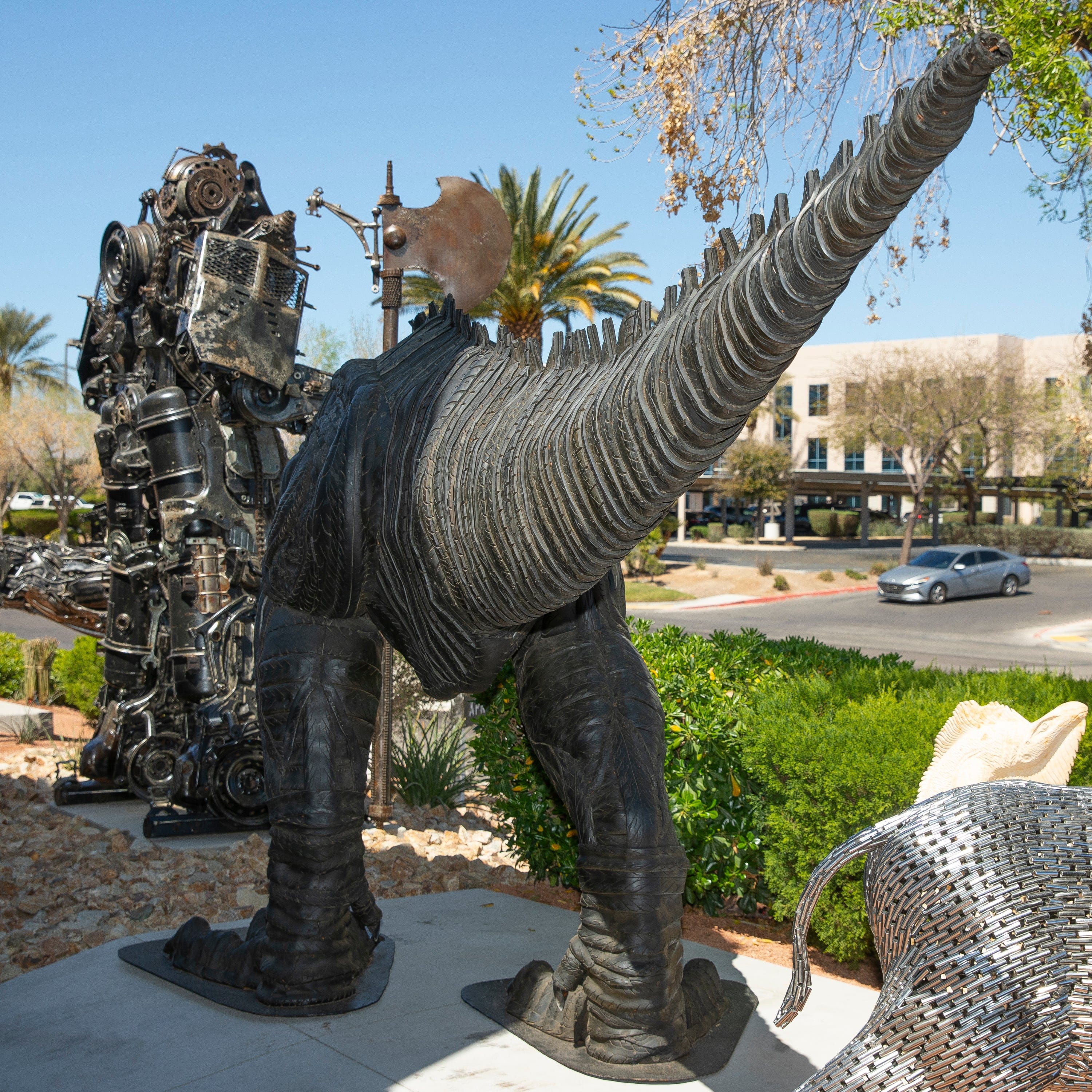 Kalifano Recycled Metal Art 18ft T-Rex Tire Art Sculpture RMS-TREXTIRE600-K