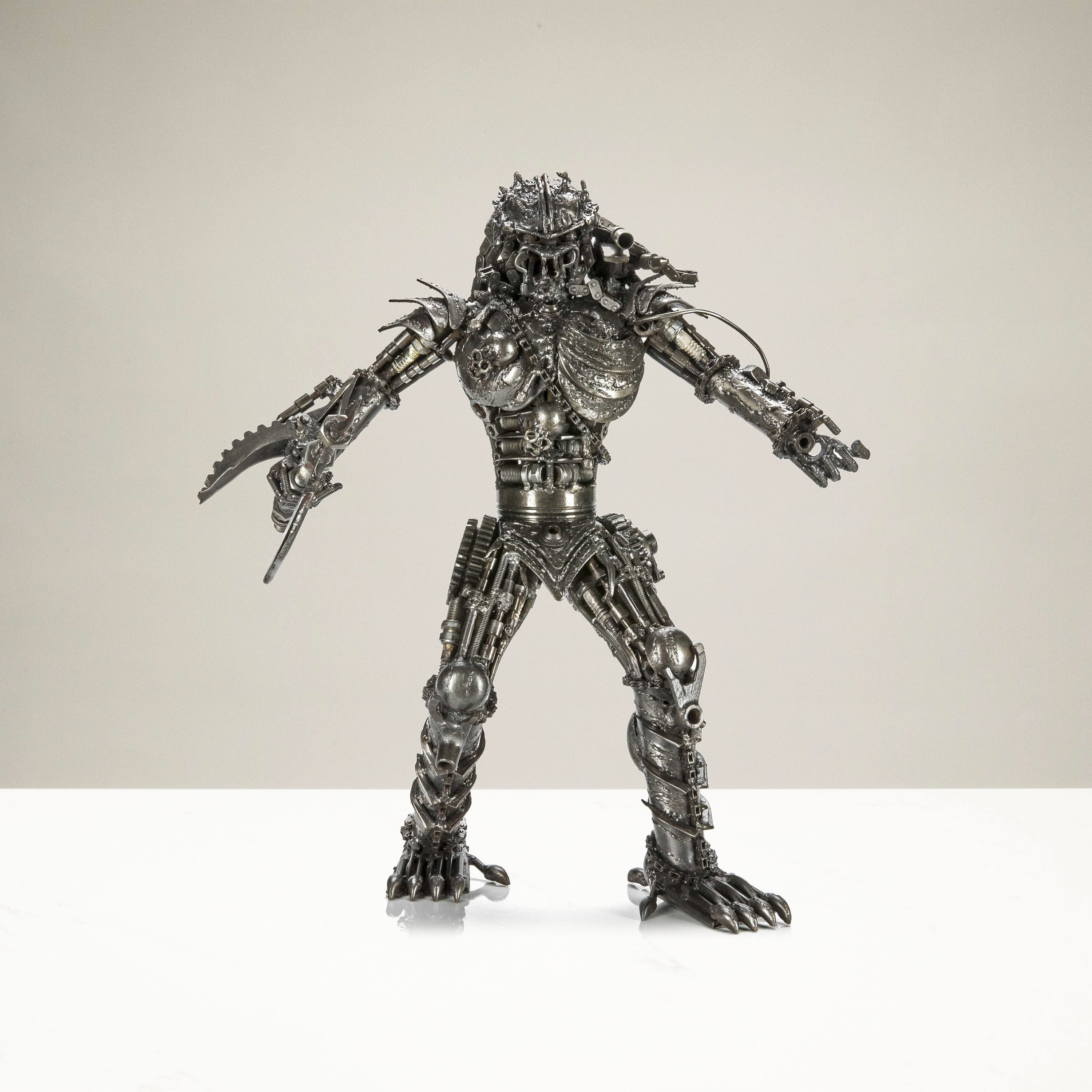 Kalifano Recycled Metal Art 23" Predator with Axe Inspired Recycled Metal Sculpture RMS-P58x41-S03