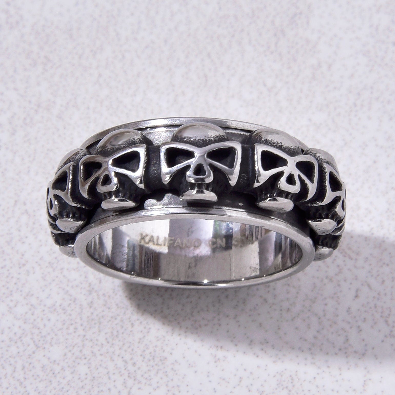 Kalifano Steel Hearts Jewelry Silver Rotatable Skull Steel Hearts Ring