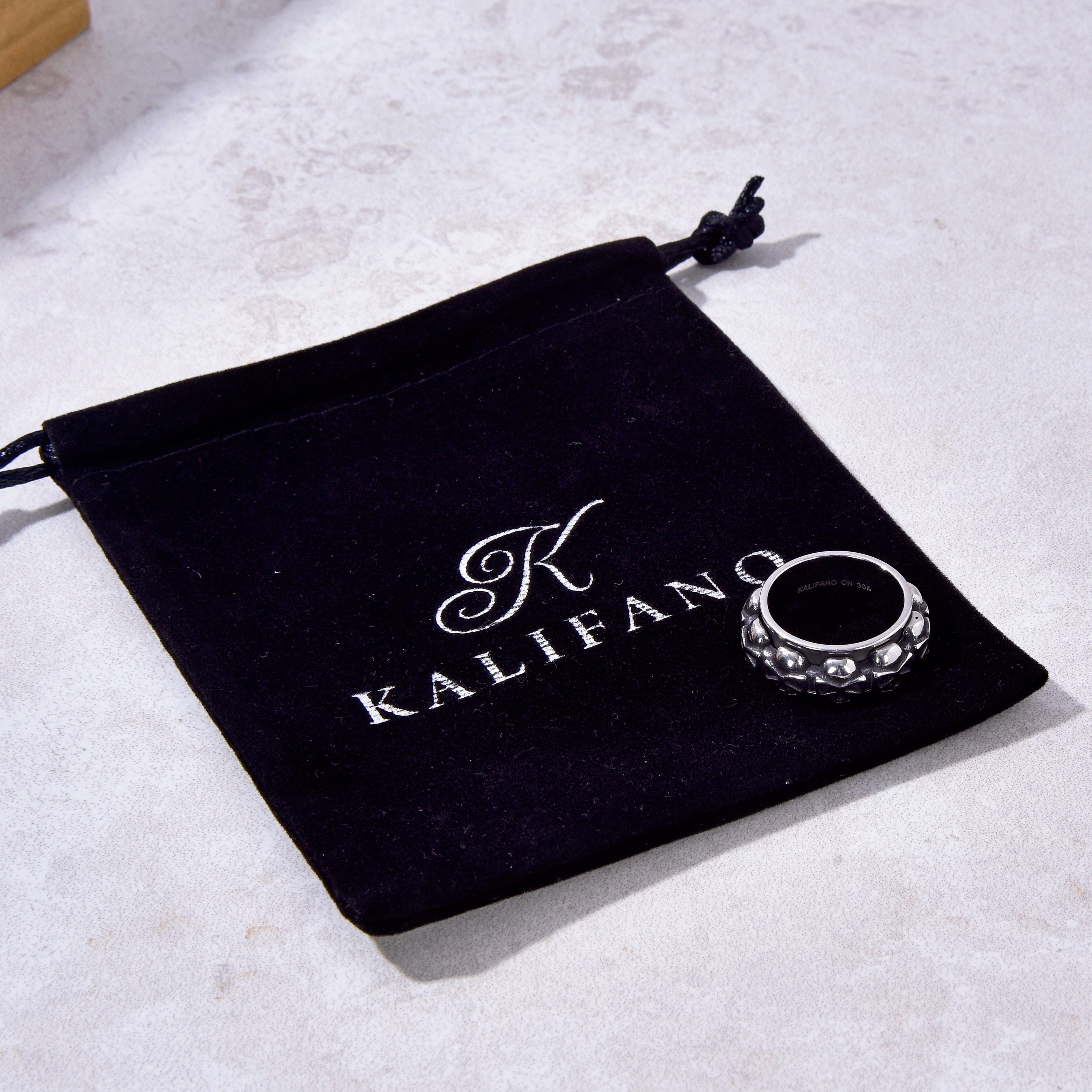 Kalifano Steel Hearts Jewelry Silver Rotatable Skull Steel Hearts Ring