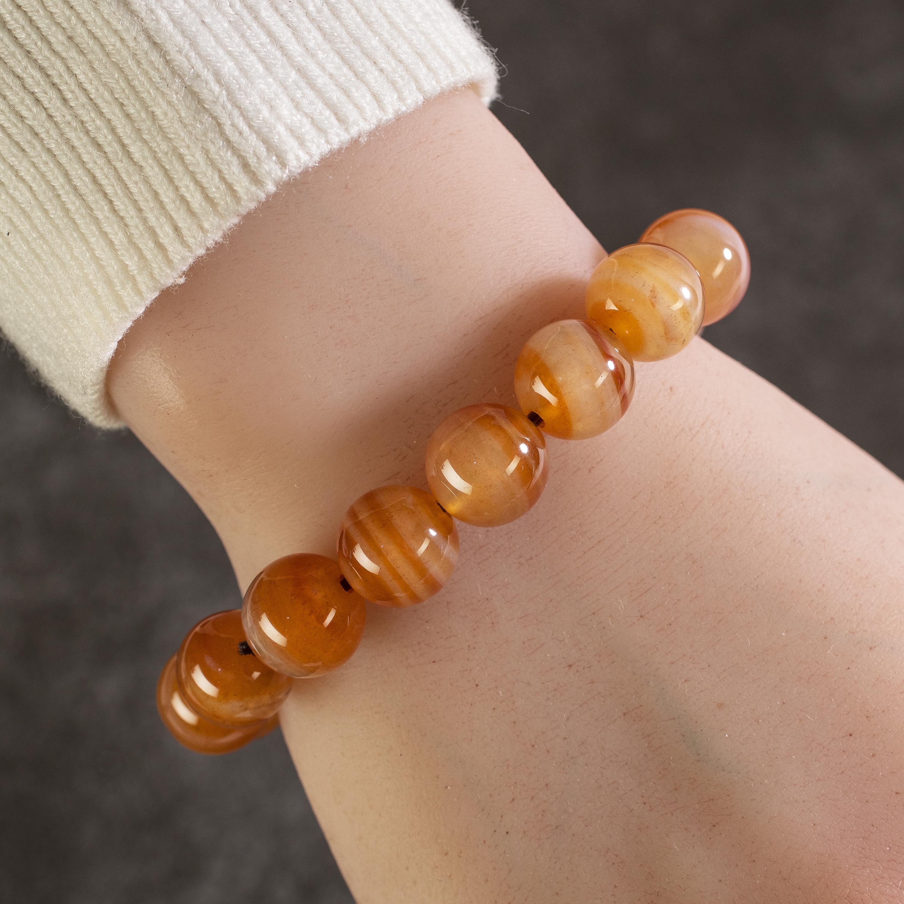 Kalifano Gemstone Bracelets Polished Banded Carnelian 12mm Gemstone Bead Elastic Bracelet RED-BGP-015