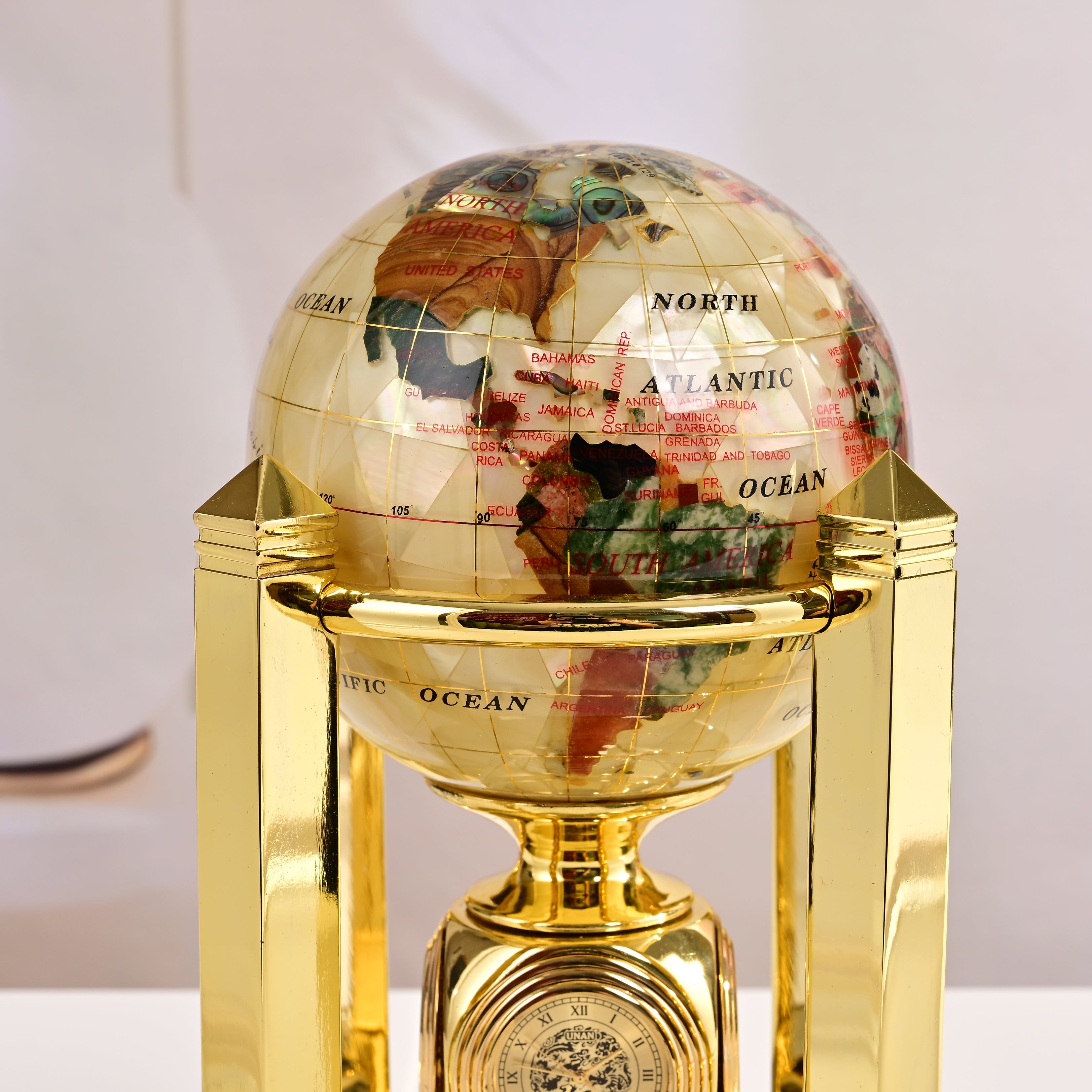 8.5" Tall Gemstone Globe with 5" Mother of Pearl Diamond Cut Ocean on 24k Gold Plated Bi-directional rotating Stand