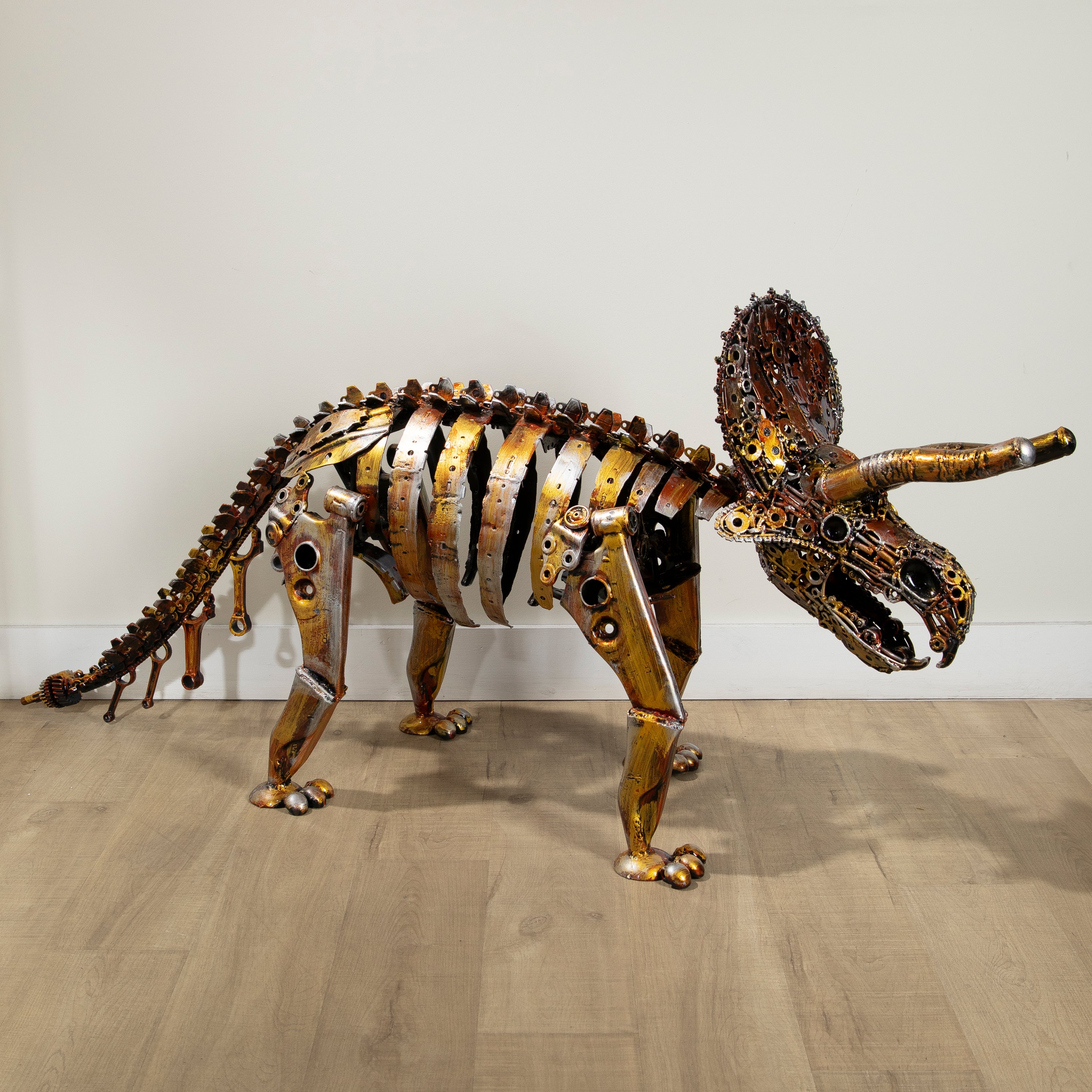 Gold Triceratops Skeleton Inspired Recycled Metal Sculpture