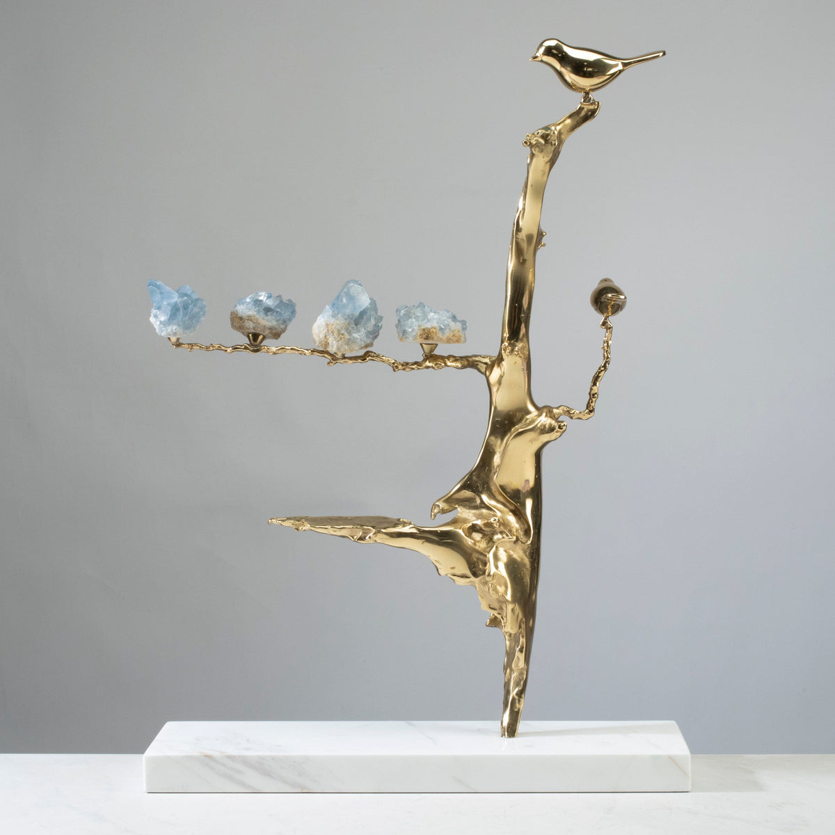 Bird on Branch with Blue Calcite