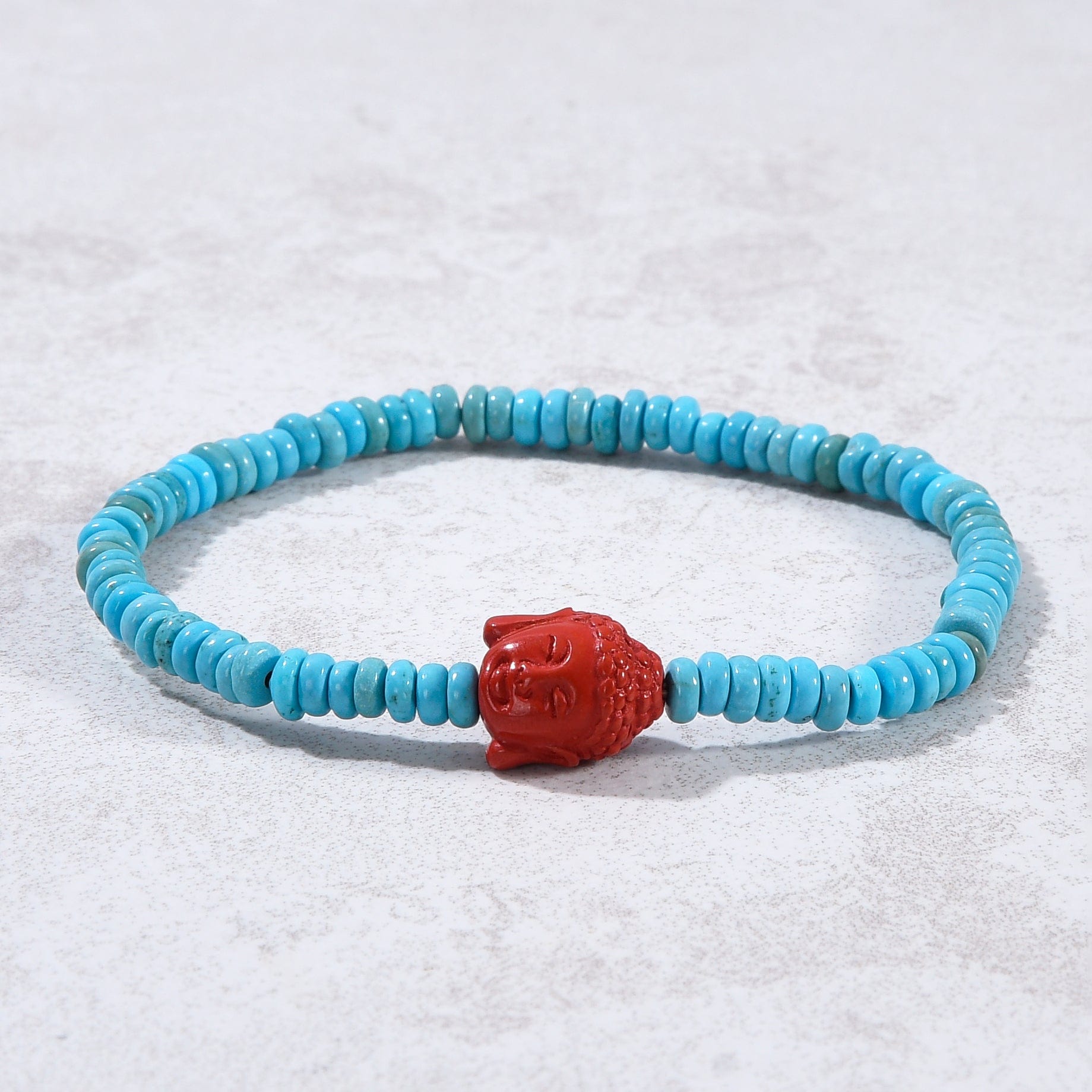 Kalifano Gemstone Bracelets Howlite Turquoise 2x4mm Elastic Gemstone Bracelet with Cinnabar Buddha