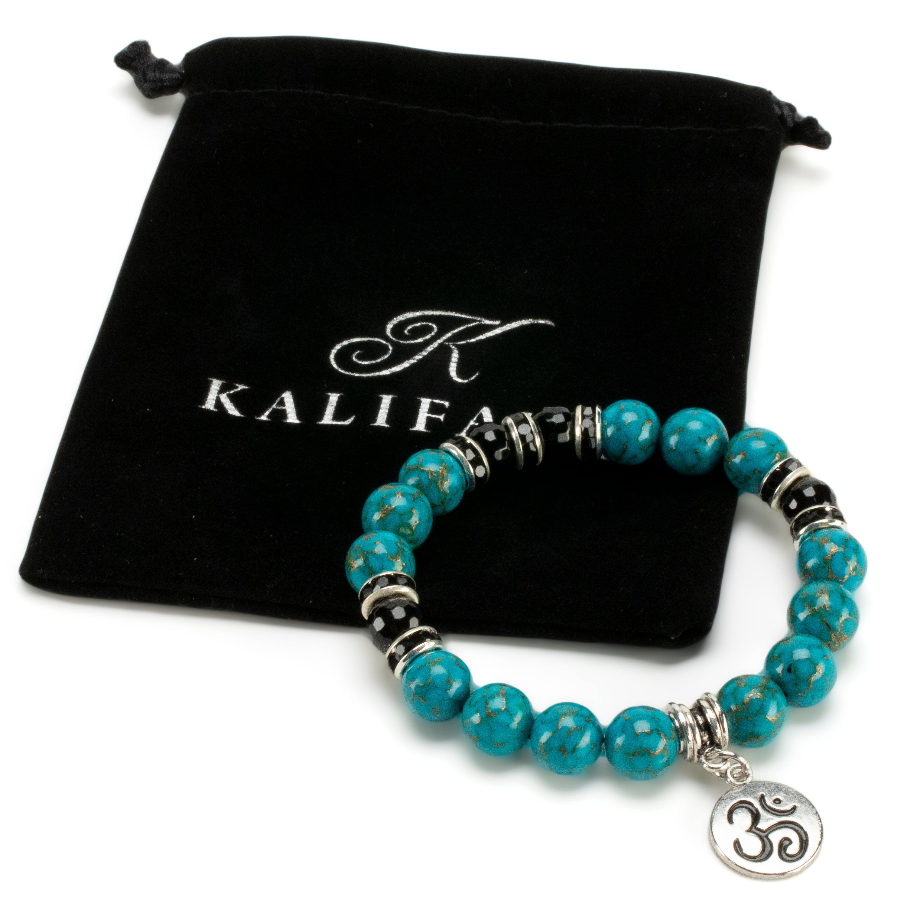 Kalifano Gemstone Bracelets Turquoise 10mm Gemstone Elastic Bead Bracelet with Ohm Charm & Black Agate Accent Beads RED-BGP-077