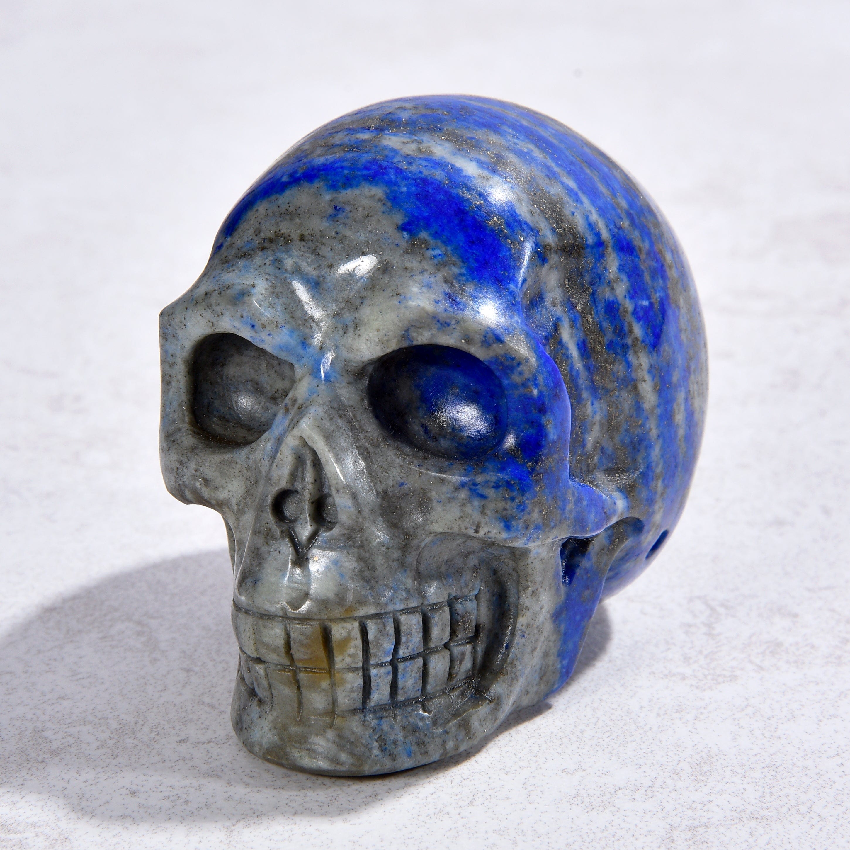 KALIFANO Gemstone Carvings 1.8" Natural Lapis Skull Gemstone Carving CVLSK.500.02