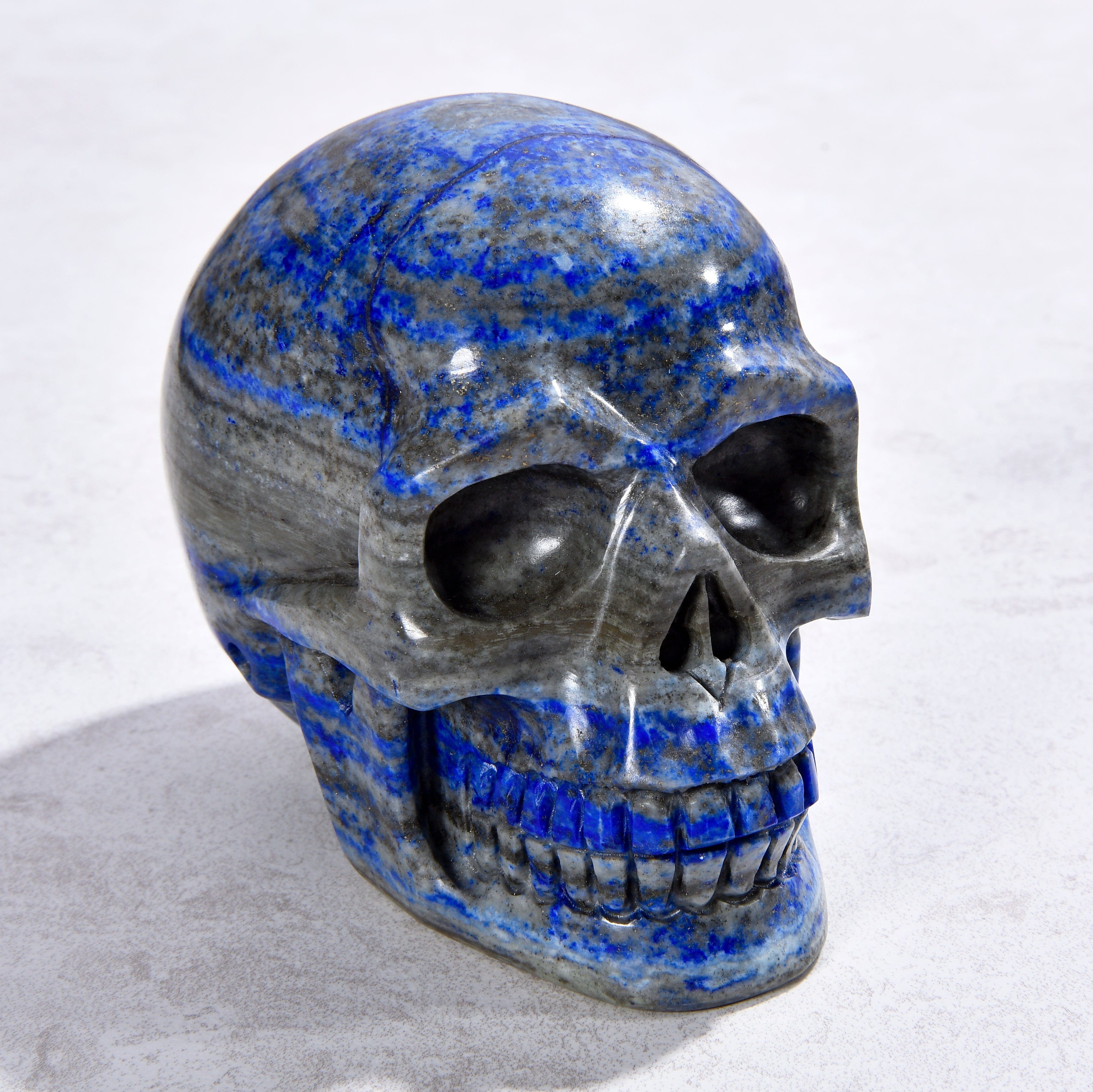 KALIFANO Gemstone Carvings 2.8" Natural Lapis Skull Gemstone Carving CVLSK.1900.02