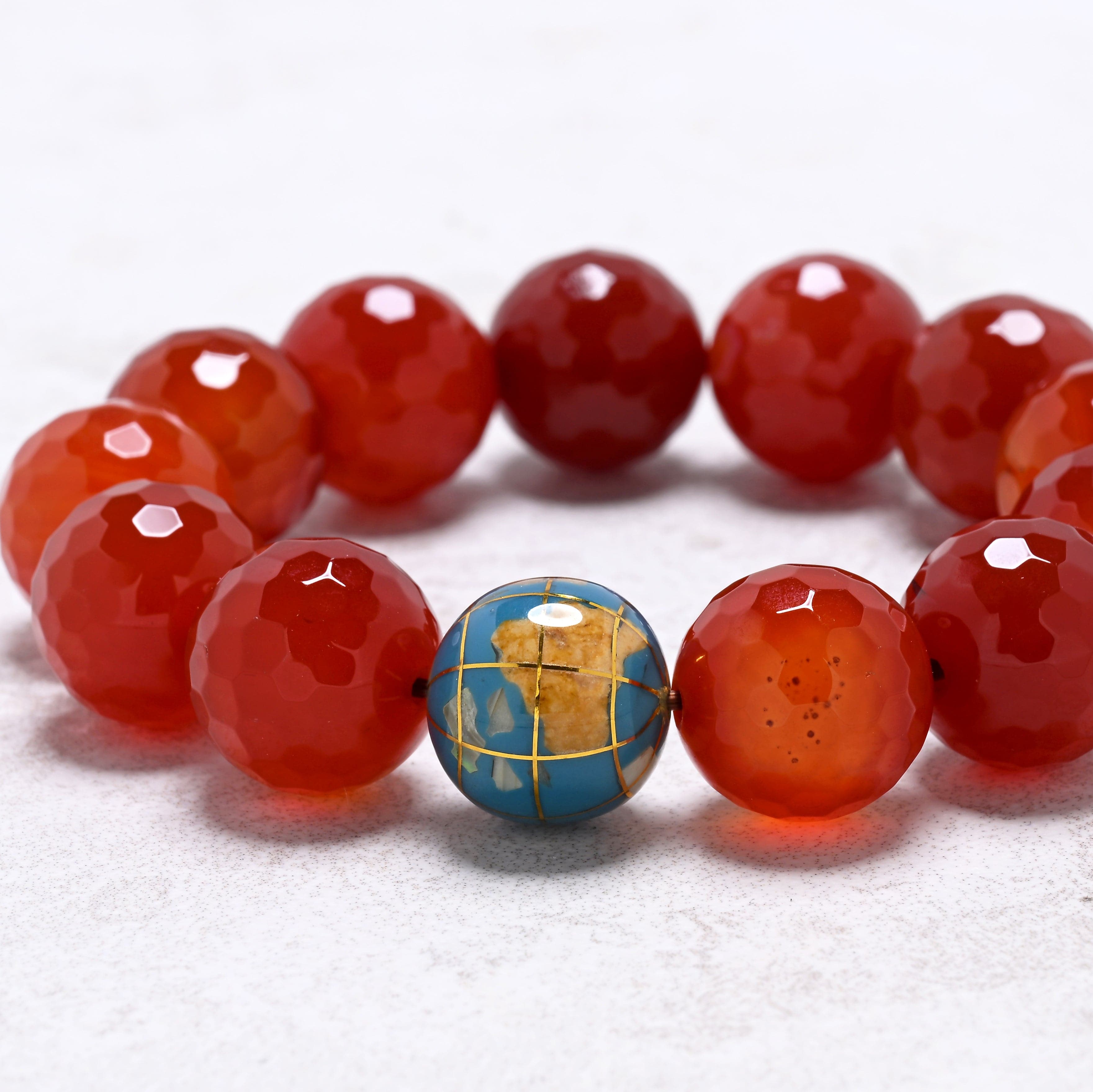KALIFANO Gemstone Jewelry 16mm Carnelian Gemstone Elastic Bracelet with Blue Globe Accent Bead