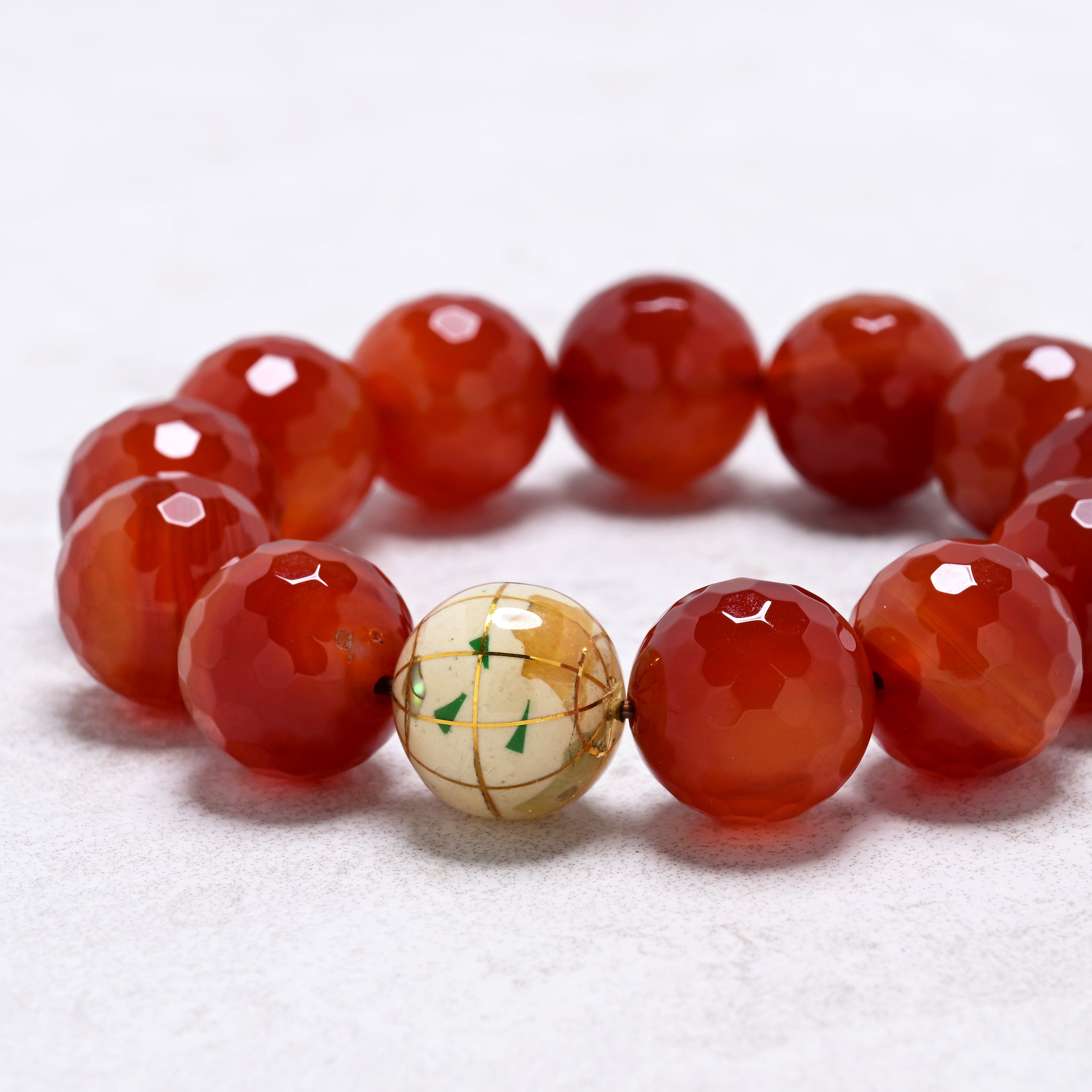 KALIFANO Gemstone Jewelry 16mm Carnelian Gemstone Elastic Bracelet with White Globe Accent Bead