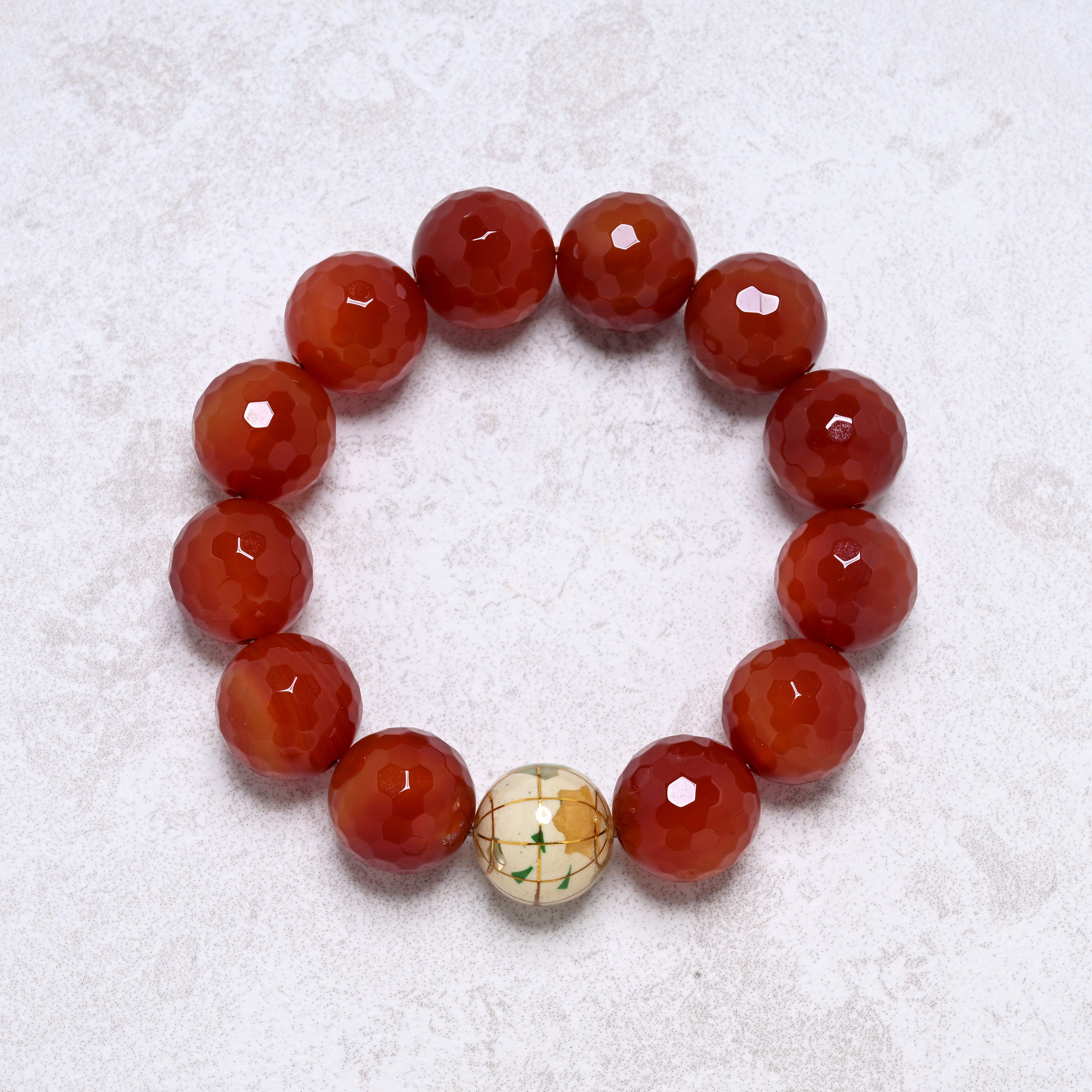 KALIFANO Gemstone Jewelry 16mm Carnelian Gemstone Elastic Bracelet with White Globe Accent Bead