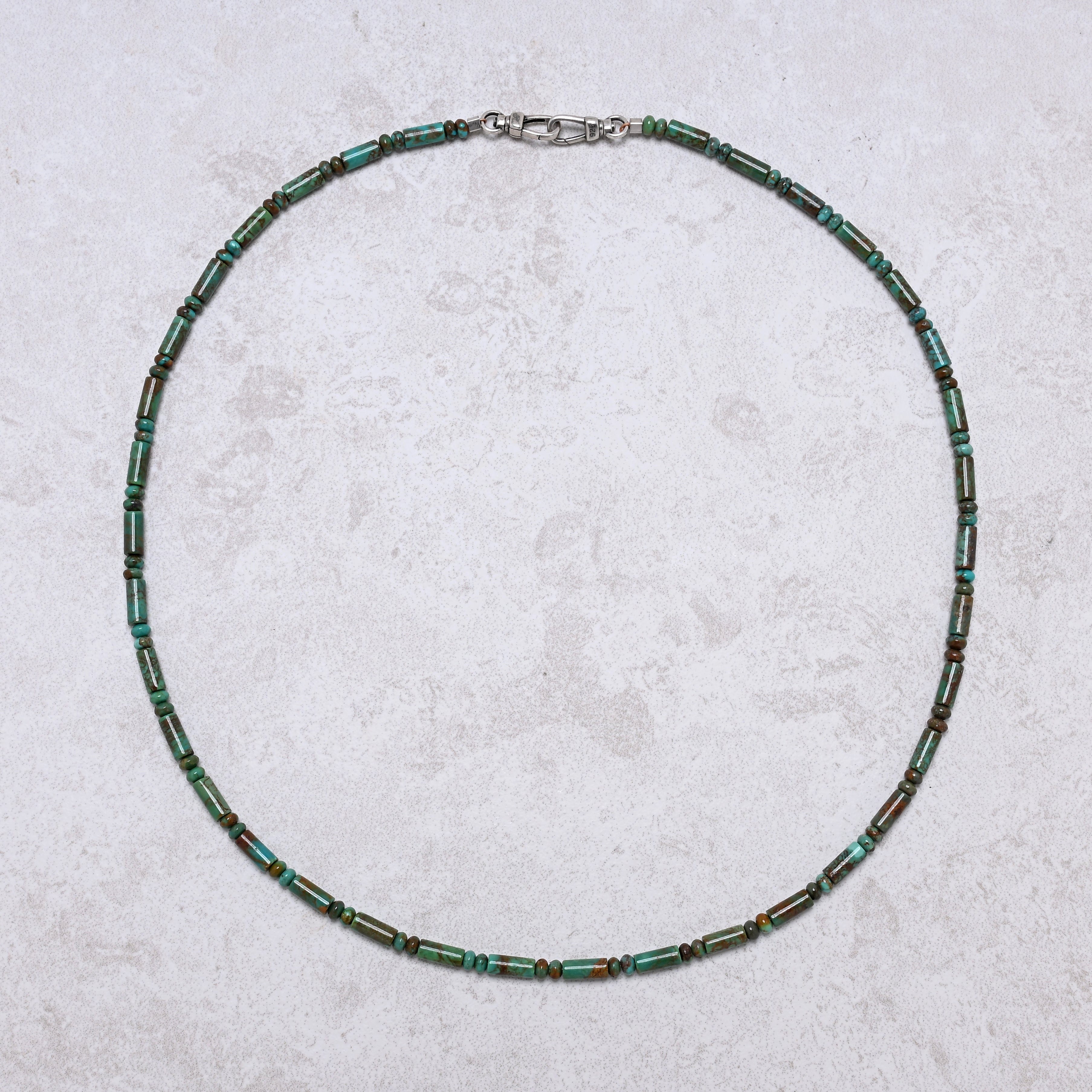 KALIFANO Gemstone Jewelry 21" Genuine Turquoise Barrel Beaded Necklace with Sterling Silver Equestrian Clasp 925N-07-TQ