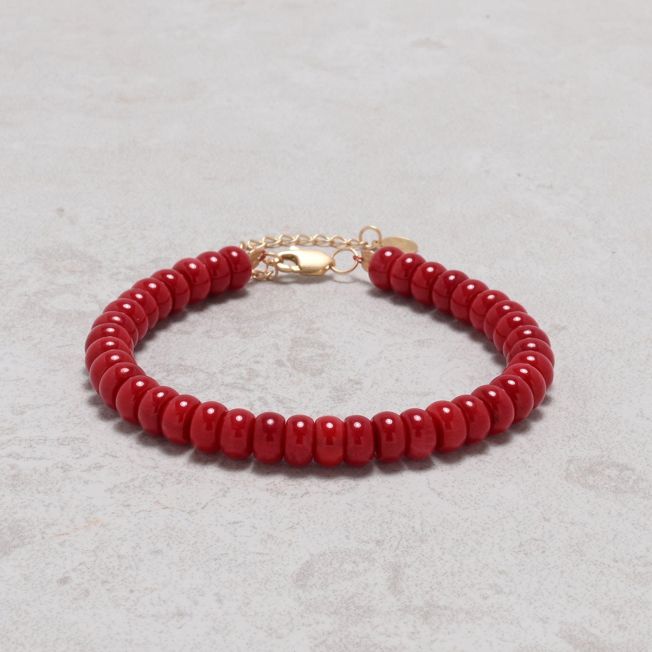 KALIFANO Gemstone Jewelry Coral 4x7mm Natural Gemstone Bracelet with Sterling Silver Clasp 925B-15-S-G