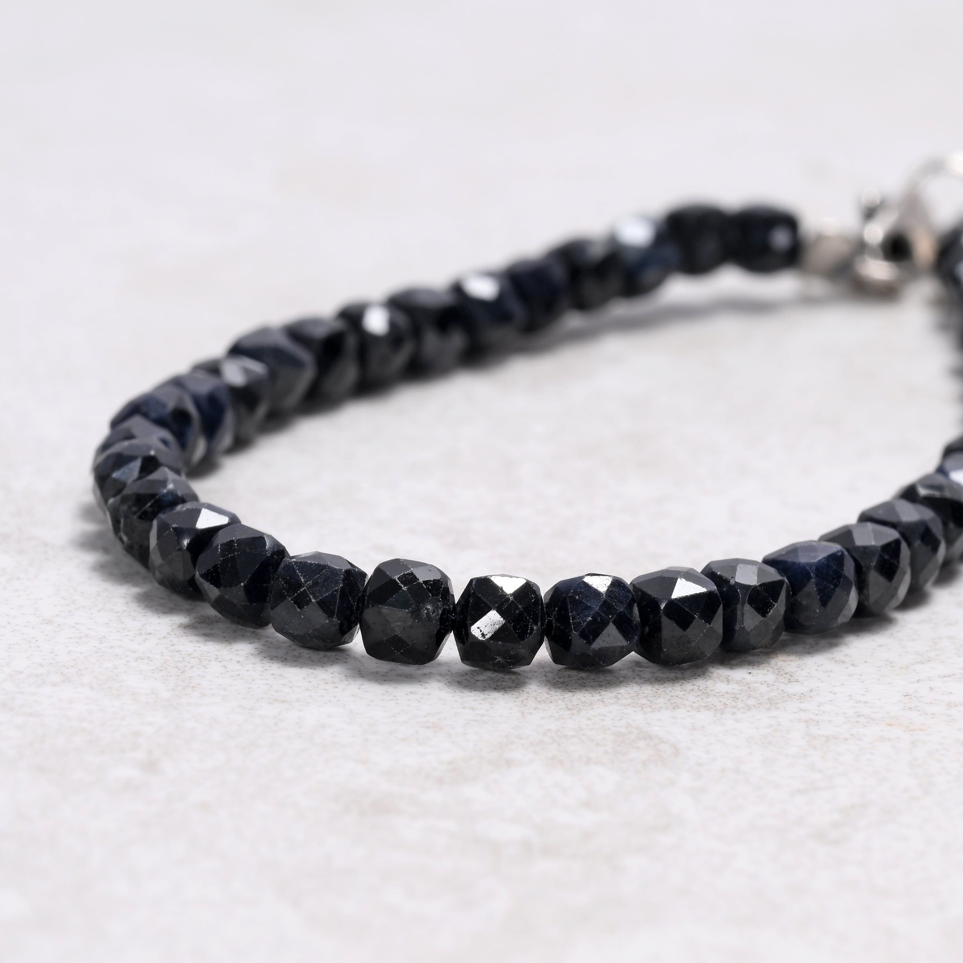 KALIFANO Gemstone Jewelry Dark Sapphire 4mm Natural Gemstone Bracelet with Sterling Silver Clasp B4-16S-SP