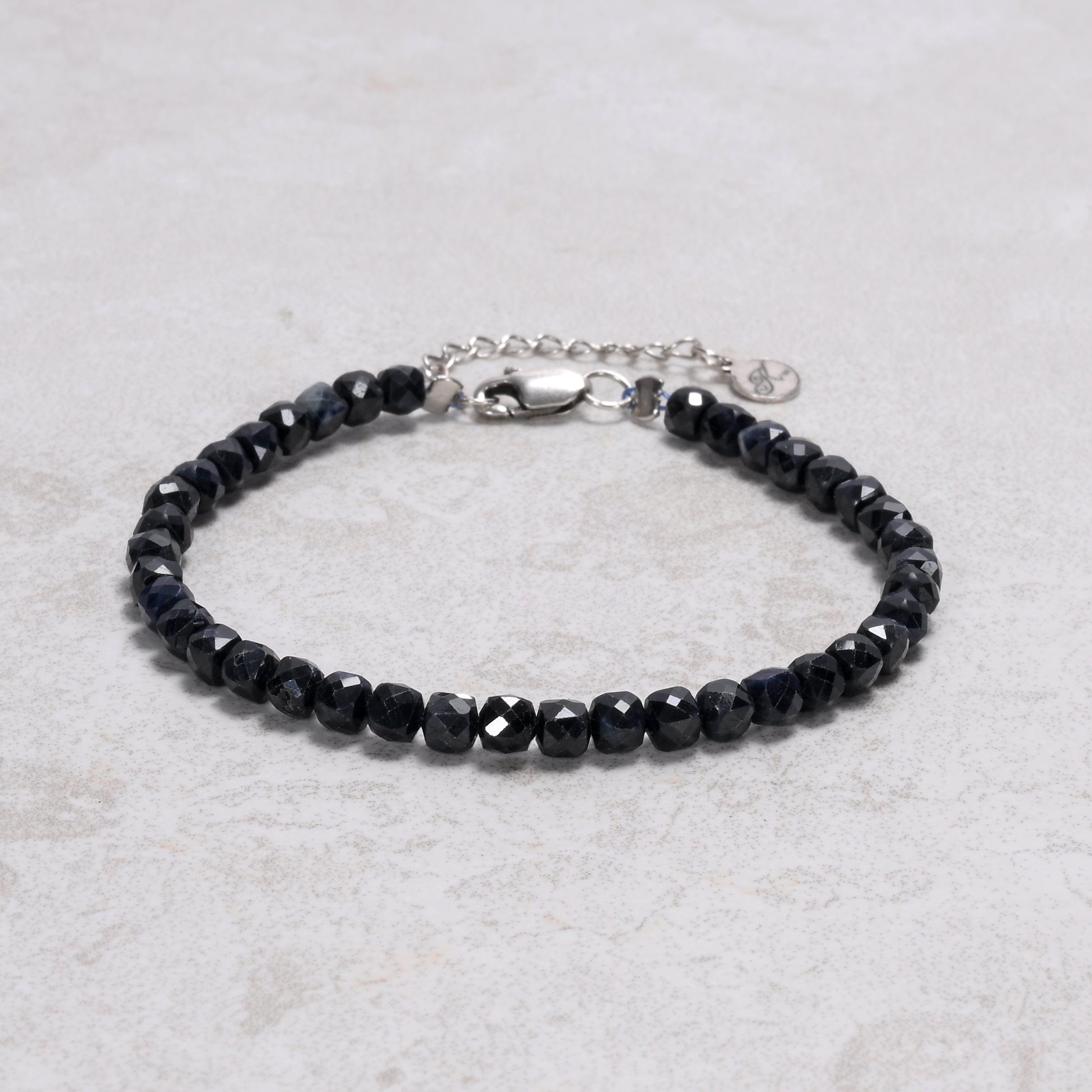 KALIFANO Gemstone Jewelry Dark Sapphire 4mm Natural Gemstone Bracelet with Sterling Silver Clasp B4-16S-SP
