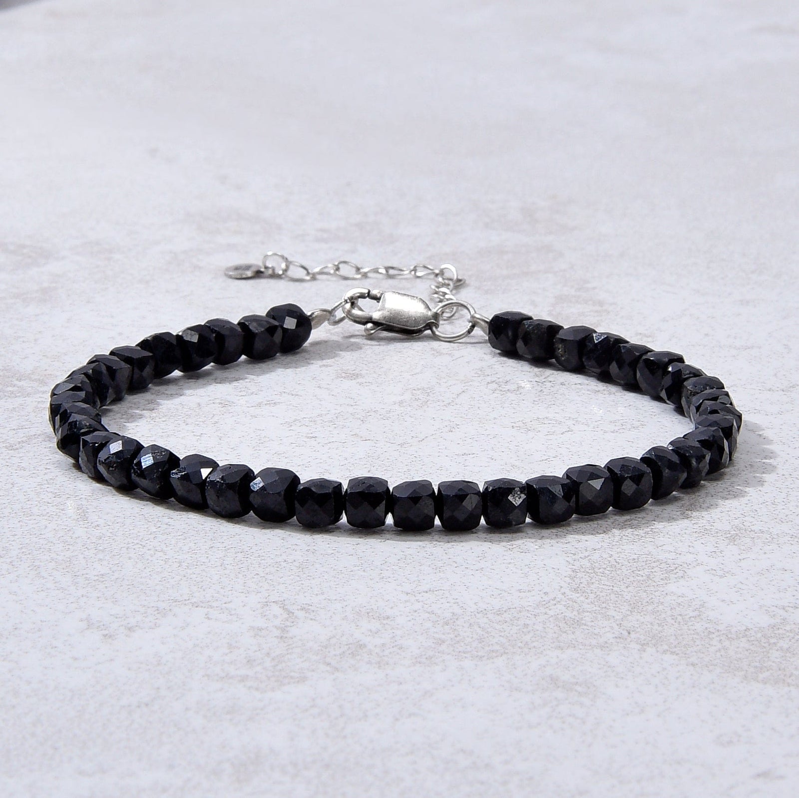 KALIFANO Gemstone Jewelry Natural Black Tourmaline Faceted 4mm Barrel Bracelet with Sterling Silver Extender B4-16S-BT