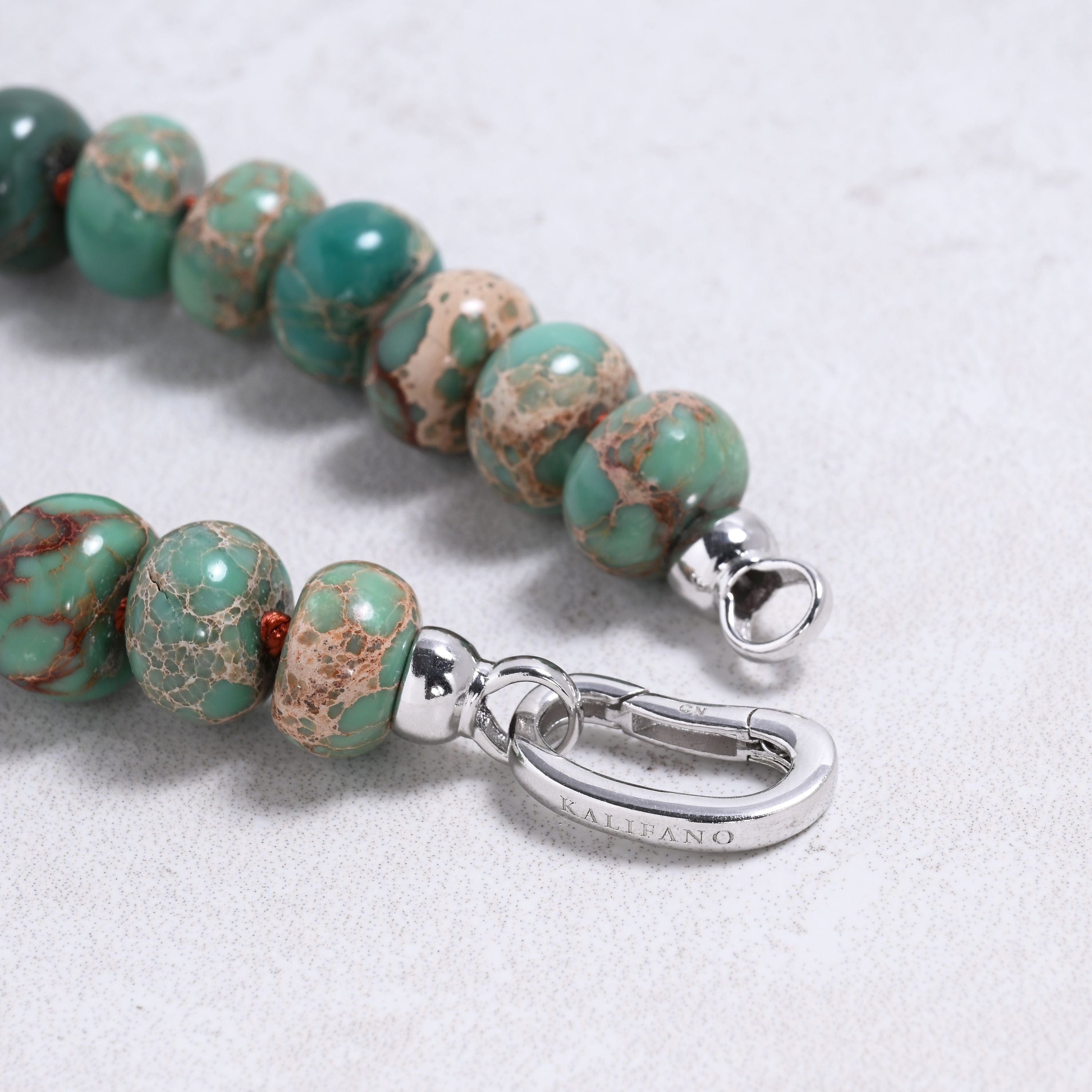 Kalifano Gemstone Jewelry Turquoise 7x12mm Roundel Gemstone Necklace with Sterling Silver Clasp - 22" 9SN-TQ2