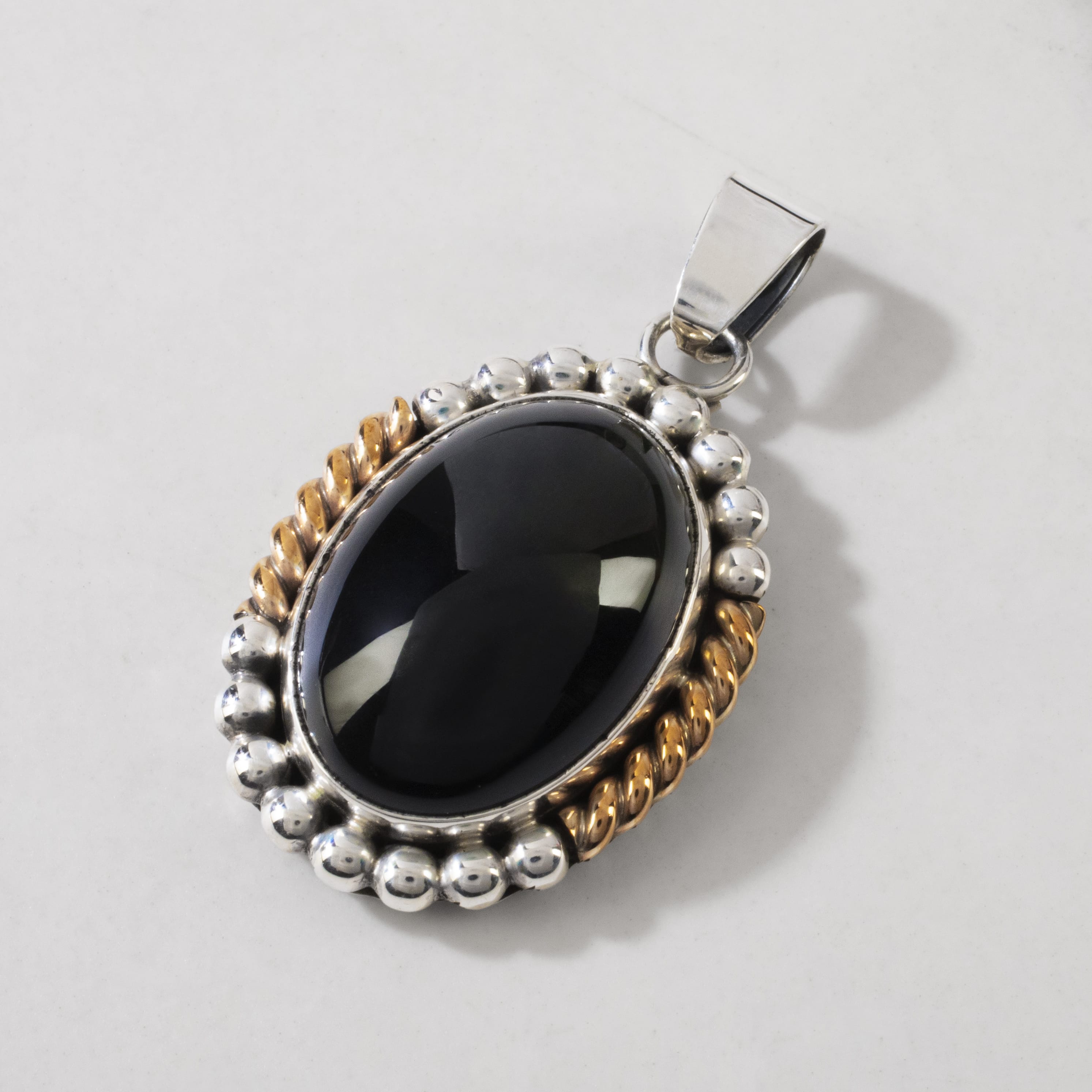 Kalifano Native American Jewelry K. Montoya Black Onyx USA Native American Made 925 Sterling Silver & 12K Gold Filled Pendant NAN550.001